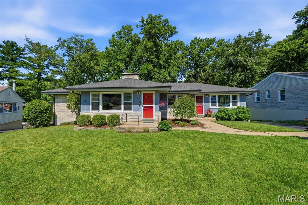 Welcome home to this charming and well-maintained ranch in Webster Groves! Built in 1950 and offering 3 bedrooms, 3 full baths, and a versatile floor plan, this home blends timeless character with comfortable everyday living. Hardwood floors flow throughout much of the main level, creating warmth and continuity across the spacious living areas. The inviting living room serves as the heart of the home and features a cozy fireplace, perfect for relaxing evenings or gathering with family and friends. The updated kitchen offers stainless steel appliances, stylish color-blocked cabinetry and easily flows into the dining room. Just beyond, the spacious family room provides additional living space and overlooks the backyard, making it an ideal spot for entertaining, movie nights, or simply enjoying the view. All 3 bedrooms are conveniently located on the main level, including a primary suite with its own private en-suite bath. Two additional bedrooms share a full hall bath, offering flexibility for family, guests, or home office needs. The partially finished walkout lower level expands the home’s living space even further. You’ll find a fun retro bar area full of character, along with a finished room that can easily serve as a recreation room, family room, office, workout space, guest sleeping area, or hobby room. A third full bath on the lower level adds convenience and functionality. The tucked-under 2 car garage provides additional storage and easy access to the home. Outside, enjoy a nice backyard with room to relax, garden, play, or entertain. The location is truly exceptional—just steps from Southwest Park and Freddie’s Market, with easy access to the restaurants, shops, parks, and community events that Webster Groves is known and loved for. Whether you’re looking for classic Webster charm, spacious living areas, a flexible floor plan, or an unbeatable location, this home delivers it all. Don't miss this one!