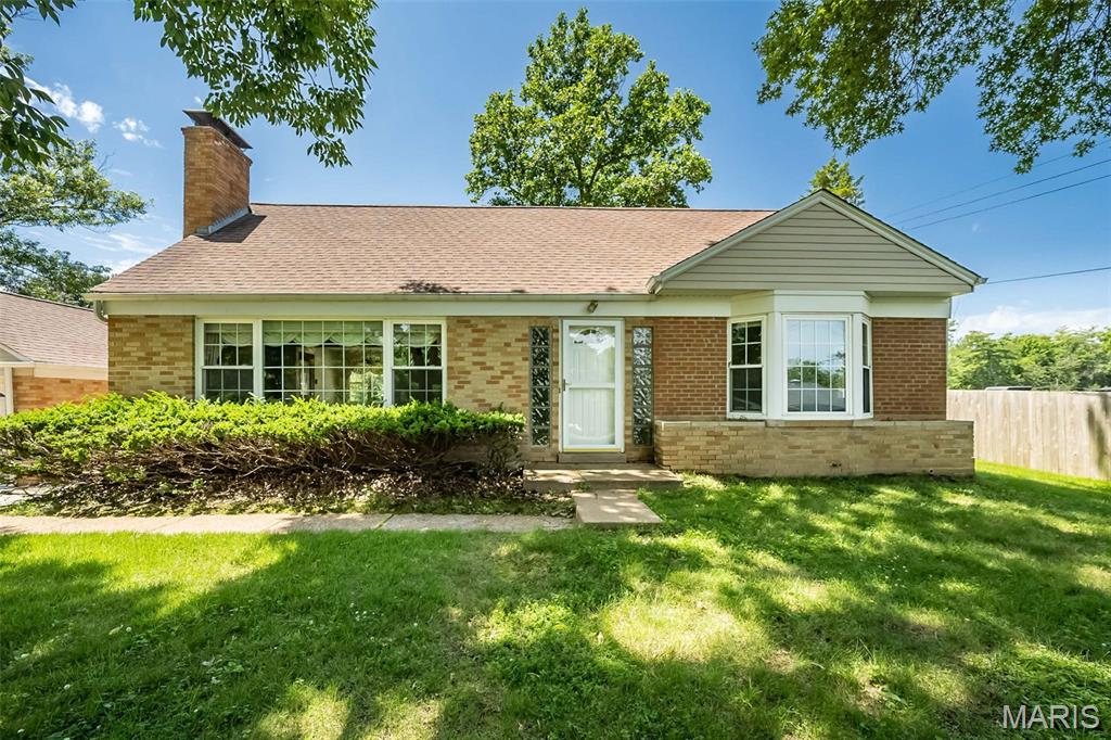 Some homes are waiting for the right person to come along and bring them forward — and 68 Mar-El Court is exactly that. Situated on a rare 1.22-acre lot in the heart of Ellisville, this solid 1958 brick story-and-a-half has been lovingly held by one family for decades, and now it's ready for a new caretaker with fresh eyes and a vision for what it can become.

The bones here are genuinely impressive. Classic construction, a 1,916 sq ft floor plan with 2 bedrooms upstairs, an owner's en-suite on the main level and a flexible main-floor family room that easily functions as a 4th bedroom depending on how you live — this home adapts to your needs. The living room centers on a striking white brick fireplace surround flanked by a dramatic dark accent wall, a focal point that wouldn't look out of place in a design magazine with the right furniture and finishing touches. The layout flows naturally, with a dining area off the kitchen and a bright enclosed porch that opens the home to the outdoors.

But the land is the story no other listing in this zip code can tell. A 1.22-acre lot running over 530 feet deep, framed by mature trees that create a private, peaceful setting unlike anything else in this corridor. Sounds like a lot of grass to cut, doesn't it? Well, the Sellers will include a riding lawn mower with attachments to save you some money! In a market where most 63011 lots are measured in tenths of an acre, this property offers something buyers have been searching for and couldn't find — room to breathe, room to play, room to build an outdoor living space worthy of a West County address. 

This is an estate sale offered as-is. A rare opportunity — one of those moments where the right buyer gets both an address people want and the chance to build equity through their own vision. The next chapter for this home is wide open. Come write it.
