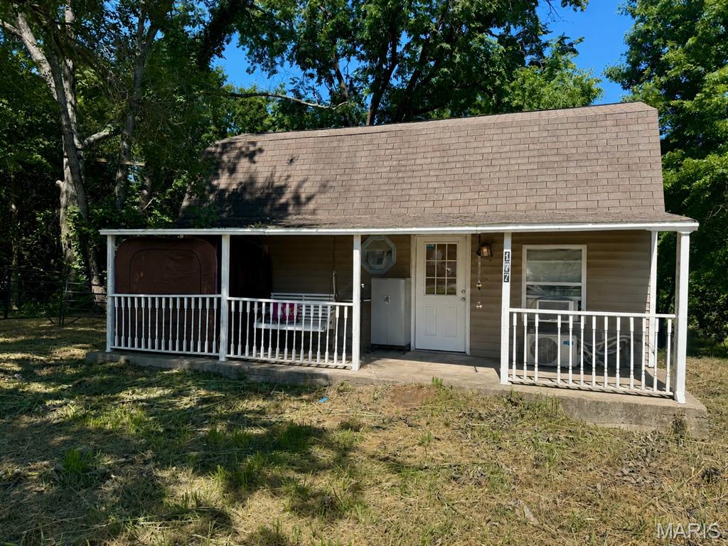 Bring your vision and make this Lincoln County fixer-upper your own! Situated on approximately 2 acres, this 2-bedroom, 1-bath home offers just under 1,000 square feet of living space. Both bedrooms are located upstairs and share a centralized walk-in closet. Covered front porch, backyard deck, county water, and Cuivre River Electric service. Whether you're looking for an investment opportunity or a project, this property offers plenty of potential. Property is being sold AS IS. Seller will make no repairs or provide any warranties.