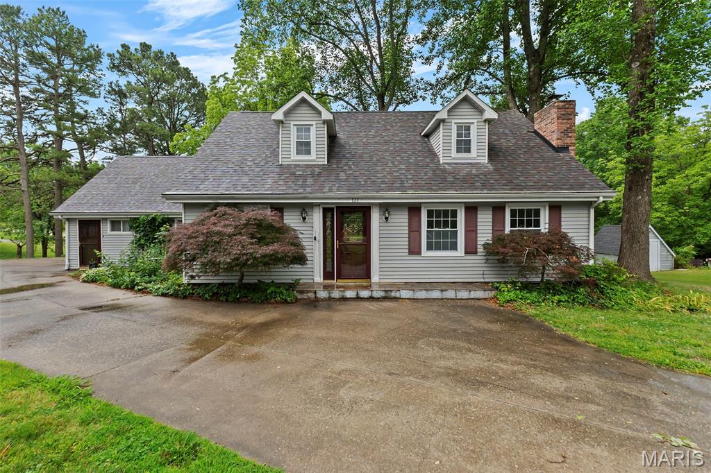 Tucked away in the lovely and private Twin Lakes neighborhood, this beautiful 3 bed, 2 bath home offers space, privacy, and a peaceful setting on an almost 2 acre corner lot. Mature trees and landscaping create incredible curb appeal, while the large driveway, half circle drive, and entrances from both streets provide excellent accessibility and parking options. Inside, you'll find fresh paint and new flooring throughout the entire home, spacious bedrooms, and gorgeous views from nearly every window. Step outside to enjoy the deck overlooking the scenic property, plus 2 storage sheds for all your tools and outdoor equipment. A rare opportunity to enjoy quiet living in one of the area's most desirable settings.