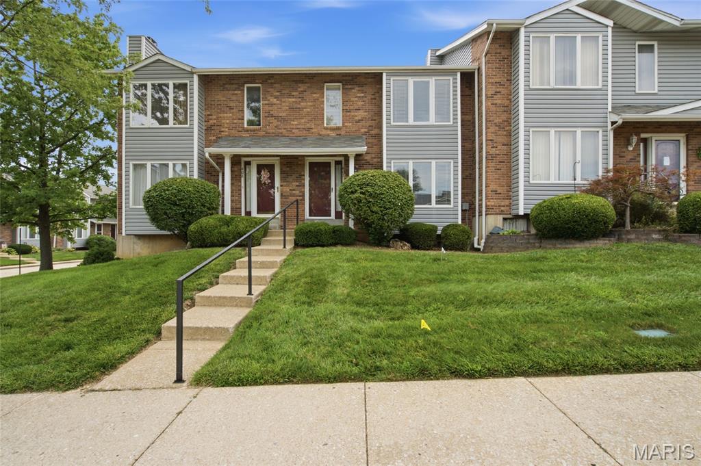 Enjoy a maintenance-free condo lifestyle with access to a pool, and clubhouse — all without spending your weekends behind a lawn mower.

This light-filled home features a dramatic 2-story entry foyer, spacious living room, and an inviting updated kitchen with wood floors, stainless steel appliances, bright updated cabinetry, and a large walk-in pantry. The breakfast room opens through a newer sliding glass door with interior blinds to a generous rear deck.

Upstairs, both bedrooms are spacious enough to serve as a primary suite. The beautifully remodeled full bath features a deluxe spa shower with a rain shower head and multiple wall sprayers, and dual sinks!

Additional highlights include an off-alley 2-car garage, convenient street parking, and a monthly fee that includes water, sewer, landscaping, and community amenities.

Located near major retailers, grocery stores, I-70, and Hwy 94, this condo offers comfort, convenience, and easy living in one great package.