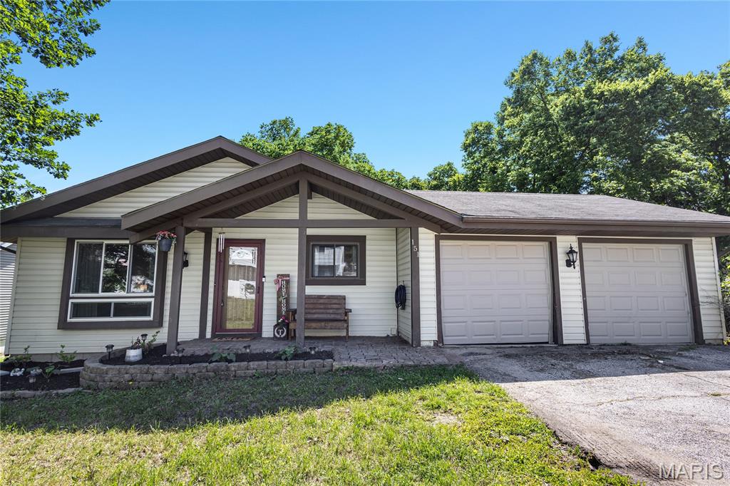 Looking for a new home that is PRICED TO SELL in the highly sought-after Rockwood School District!? This charming 3 bed, 2 bath ranch backs to a wooded area offering incredible privacy and frequent deer sightings. Tucked away from street traffic, you’ll enjoy added peace, privacy, and extra guest parking.

This home showcases fresh landscaping, a spacious deck perfect for relaxing or entertaining, and a nice eat-in kitchen featuring newer cabinetry, stainless steel appliances, two pantries, granite countertops. Hardwood floors add warmth and character throughout areas of the main level. The bathrooms have been refreshed with newer luxury vinyl plank flooring, which continues into the basement for a cohesive, updated feel.

The walk-out lower level offers incredible additional living space with a large rec room, two sleeping rooms, wood-burning fireplace, recessed lighting, wet bar, half bath, workshop area, laundry room, storage room, and large newer water heater. 

Conveniently located with easy access to shopping, restaurants, parks, and Six Flags! Enjoy neighborhood amenities including a pool, clubhouse, basketball and tennis courts, fishing pond, playground, and community events! WELCOME HOME
