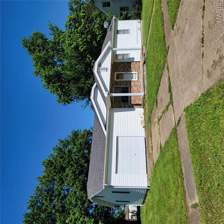 Welcome home to this 3-bedroom, 1-bath ranch-style residence built in 1990. Offering convenient one-level living, this home features a functional floor plan with comfortable living spaces. Situated on a spacious corner lot, the property boasts a large backyard with ample room for outdoor entertaining, gardening, pets, or play. Whether you're a first-time homebuyer, looking to downsize, or seeking an investment opportunity, this home offers both comfort and practicality. Located in the heart of Belle, you'll enjoy small-town living while being just minutes from local schools, the city park, restaurants, and community amenities.