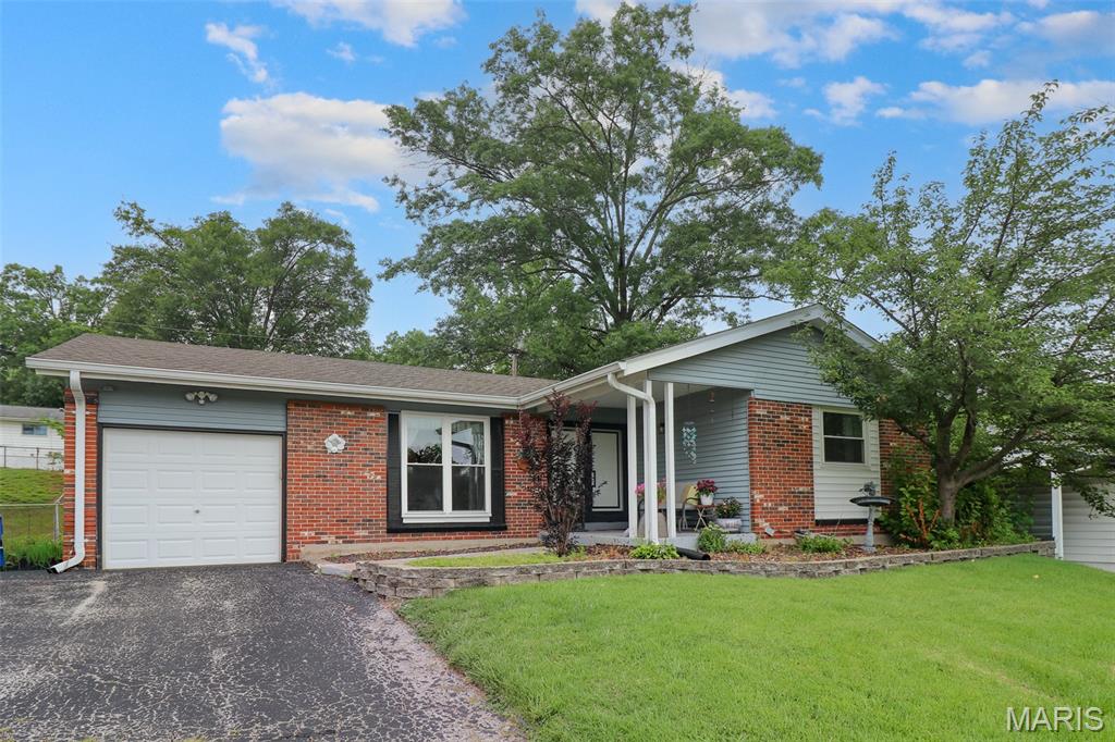 Great LOCATION! 3 bedrooms with 2 1/2 baths located in Rockwood School District.  Main level features 3 bedrooms (wood floors), 2 full baths, living room and eat-in kitchen. Relax in the finished basement featuring a family room, wet bar, 1/2 bath and plenty of storage.  Enjoy your evenings outside on the covered patio with a fenced in landscaped yard.   Easy access to Hwy 44, 270, 141 and Hwy 30. Call to set up your showing.  This property will not last long.