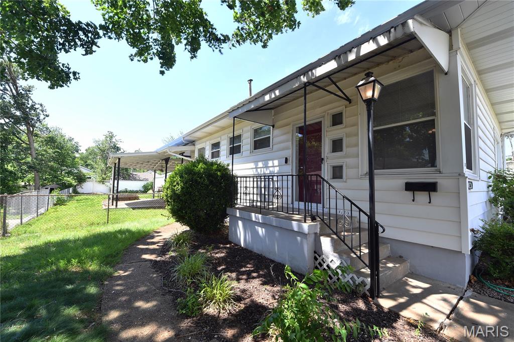 Extra large 3 bedroom / 2 full bath ranch with plenty of extras!  This home has plenty to offer with every detail addressed. Beautiful real wood floors with warm neutral paint colors and crisp white trim. Huge living room - large windows - oversized eat-in kitchen and beautiful renovated bathrooms.  Basement features washer and dryer, full bathroom, and tons of workshop and/or storage space.  Fence rear yard with two car detached garage; workbench, abundant surface parking, and wrap around covered patio!  Wrap around covered rear patio!  Close proximity to Highway 55, South County, Anheuser-Busch Brewery, and Jefferson Barracks.