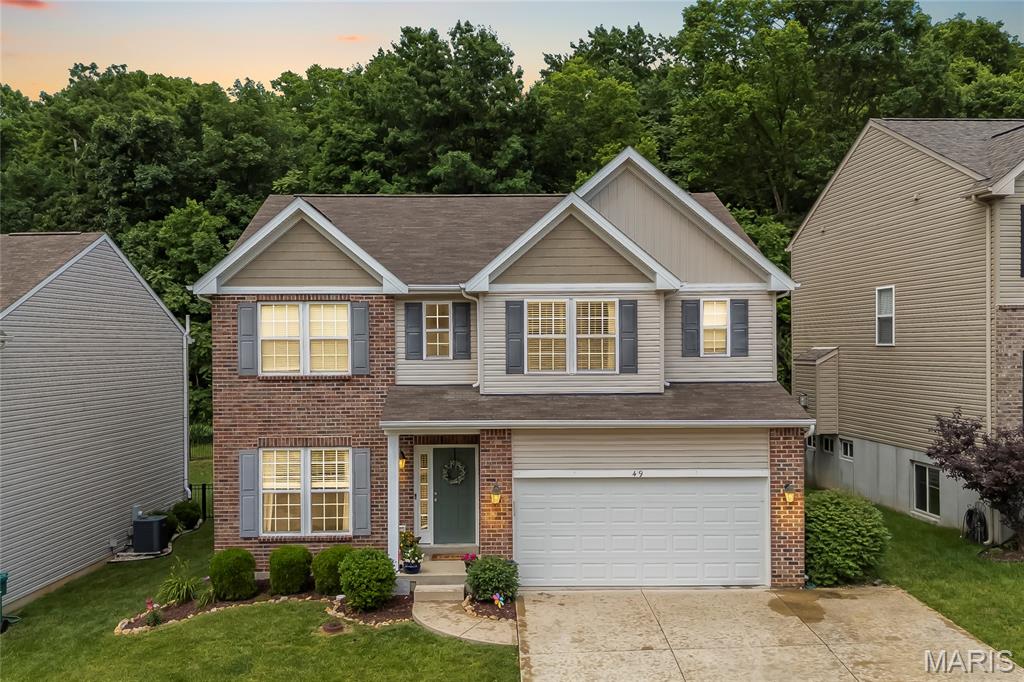 Built in 2016, this immaculate 4-bedroom, 2.5-bath home checks every box, and then some. From the moment you step onto the covered front porch, the quality and care put into this property are unmistakable.

Inside, the open-concept main level is anchored by gleaming hardwood floors, a spacious living room with gas fireplace, and a kitchen designed to impress. White cabinetry, stainless steel appliances, a generous island with seating, and a walk-in pantry make this space as functional as it is beautiful. The adjacent dining area is flooded with natural light, and the layout flows effortlessly, perfect for everyday living and entertaining alike.

Upstairs, the primary suite offers a private retreat with an en-suite bath, while three additional bedrooms provide flexibility for family, guests, or a home office. The partially finished basement adds valuable bonus space; ideal for a rec room, playroom, or home gym. Step outside to a private backyard retreat complete with a deck, mature landscaping, and plenty of room to relax or entertain. The attached garage and thoughtful storage throughout round out this turn-key package.

2016 construction means modern mechanicals, energy efficiency, and the peace of mind that comes with a younger home, without the wait of new construction. Don't miss this one.