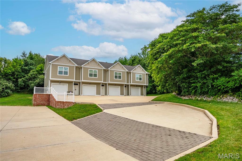 Rare opportunity to acquire a premium multifamily investment in one of Cape Girardeau's most desirable residential communities. Located within the highly sought-after Walden Park subdivision, these well-maintained townhome properties offer investors a combination of quality construction, luxury finishes, and strong rental demand that is seldom available in today's market.

Each spacious 2-bedroom, 2-bathroom townhome features approximately 1,000 square feet of thoughtfully designed living space with an open-concept floor plan, luxury vinyl plank flooring, quartz countertops, stainless steel appliances, modern cabinetry, generous walk-in closets, a dedicated computer nook with built-in desk, in-unit washer and dryer, and an attached two-car tandem garage with private entrance.

Built approximately five years ago, these properties provide investors with a newer, low-maintenance asset designed to attract and retain quality tenants. Residents also enjoy access to exceptional neighborhood amenities, including a resort-style swimming pool, clubhouse, and 24-hour fitness center.

Beyond the homes themselves, Walden Park offers an outstanding lifestyle with direct access to the City of Cape Girardeau walking trail system and the scenic hiking trails of Cape Girardeau County Park North leading to the Nature Center.

Whether you're expanding an existing portfolio or completing a 1031 exchange, opportunities to purchase multifamily properties of this caliber in Walden Park are exceptionally rare. These assets combine desirable amenities, an established location, and proven tenant appeal into an investment opportunity that seldom becomes available.