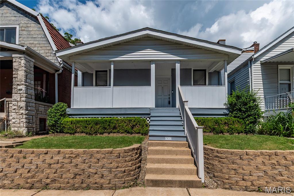 Welcome home to this charming South City gem in the heart of Bevo Mill! From the moment you arrive, you'll appreciate the inviting covered front porch and timeless brick exterior that give this home so much character.
Inside, you'll find beautiful hardwood floors, spacious living and dining rooms filled with natural light, and classic arched doorways that add to the home's original charm. The oversized dining room is perfect for hosting family dinners or entertaining friends, while the kitchen offers abundant cabinet and counter space with room to make it your own.The finished lower level provides valuable additional living space—ideal for a family room, playroom, home office, or workout area. Upstairs, the generously sized bedrooms offer comfortable retreats with plenty of natural light. Step outside to enjoy the fully fenced backyard with a patio, providing the perfect space for pets, kids, summer BBQs, or relaxing evenings outdoors. Located in the vibrant Bevo Mill neighborhood, you'll love being minutes from local restaurants, coffee shops, parks, and everything South City has to offer.