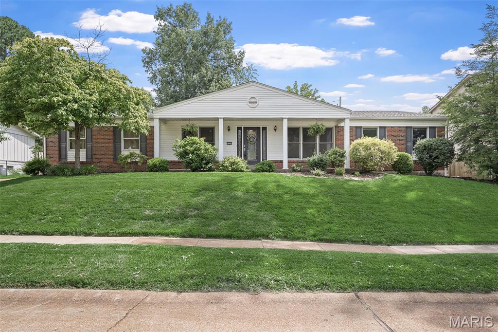 Truly move-in ready sprawling ranch offers 3 bedrooms, 3 full bathrooms, and an abundance of natural light throughout. Gleaming hardwood floors flow through the spacious living room, separate dining room, and inviting family room, creating a warm and welcoming atmosphere.

The kitchen is the heart of the home, featuring custom cabinetry with cabinet drawers, a built-in pantry, oversized center island, gas range, stainless steel appliances, new sink and faucet, and a new dishwasher. Just off the kitchen, the family room provides the perfect space for entertaining or relaxing.

The spacious primary suite includes a private full bath and generous closet space. Two additional bedrooms—including an exceptionally large secondary bedroom—all feature ceiling fans, and a second full bathroom completes the main level. A large hallway closet provides excellent storage and even offers the potential to relocate the laundry to the main floor.

The finished lower level adds incredible living space with a huge recreation room featuring brand-new carpet, fresh paint, and updated lighting. You'll also find a full bathroom with a dual vanity and walk-in shower, two additional sleeping rooms or home offices, and abundant storage space.

Step outside and enjoy the outstanding curb appeal with a rear-entry two-car garage, new garage door, oversized concrete driveway with a basketball hoop, beautifully maintained yard, and an incredible covered composite deck featuring a vaulted roof, large ceiling fan, and TV mount—perfect for entertaining or watching the game. The outdoor storage shed stays with the home, providing even more storage. Additional updates include a new front door and a 1-year-old roof.

Located in the highly sought-after Lindbergh School District with convenient access to major highways. This wonderful neighborhood offers a great mix of longtime residents, young families, and plenty of neighborhood kids. This truly move-in-ready home has everything you've been looking for and won't last long!