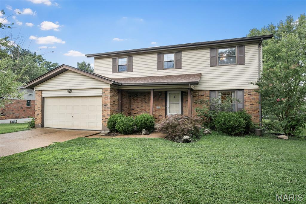 Spacious 2 story on a level corner lot in Crestwood. This 4 bedroom, 2.5 bath traditional brick/vinyl home is located in a spectacular neighborhood. Hardwood floors throughout the main level, living room with stained glass french doors. Newer kitchen with large center island, planning desk, pantry, 42" maple cabinetry, double oven and ceramic tile floors. The breakfast room is open to the oversized family room with wood burning fireplace and french door leading to the back patio and yard. Upstairs, the master suite is generously sized with a large walk in closet and full en-suite bath.  3 additional bedrooms and a 2nd full bath complete this level. The basement is unfinished, open and has full sized laundry. 2 Car Garage. This home has been well loved and is ready for a new owner. Showings start Friday 7/10.