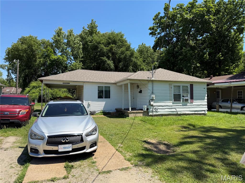 This well-maintained 3-bedroom, 1-bath home offers immediate rental income with a long-term tenant already in place. Features include a newer roof, newer central heating and air conditioning, updated electrical and plumbing, covered parking, and a private driveway. The home has been long-term occupied and is move-in ready, making it an excellent addition to any investment portfolio or a future owner-occupant opportunity. Conveniently located and offering low-maintenance living, this is a turnkey property you won’t want to miss.