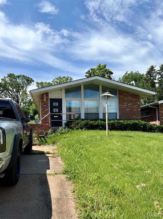 Attention investors, contractors and rehabbers! This all-brick 3 bed 1.5 bath home is ready for your transformation. Includes a spacious floor plan, eat-in kitchen, 3 bedrooms, 1.5 baths, basement and off street parking. Nice sized backyard with a paved patio area. Off-street parking pad in the front for up to 3 or more vehicles. Property is in need of a renovation and is being sold AS-IS. Seller has no knowledge of the property or its condition. Please complete due diligence before submitting your offer. Great opportunity for an experienced investor seeking a renovation project or an addition to their rental portfolio. Don't miss it!