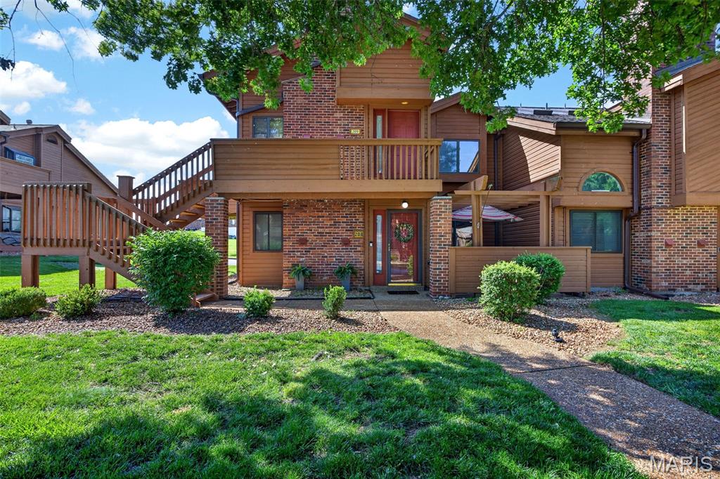 1 bedroom AND a private loft!! Rarely available and impossible to pass up in one of the area’s most sought-after communities, this beautifully maintained ground-level, end-unit condo offers resort-style living with unmatched convenience! Surrounded by mature trees and lush green lawns, this home features an open floor plan that is filled with natural light and tons of updates.

Inside, you’ll find charming details throughout - a cozy wood-burning fireplace with a floor-to-ceiling brick, an oversized garage, an open-concept kitchen that offers granite countertops, a breakfast bar, freshly painted cabinetry, and a lovely garden window, making it both functional and inviting.

The spacious primary suite includes a large walk-in closet and access to your private courtyard patio— perfect for entertaining or relaxing.  Upstairs, there is a private, roomy loft featuring vaulted ceilings, a skylight, a vanity w/a sink, a large walk-in closet, and additional storage. This provides flexible living space for an additional sleeping area, guests, an office, or even hobbies.

Enjoy the exceptional community amenities, including a clubhouse, lake, pool, hot tub, tennis and pickleball courts, walking paths, a peaceful fountain, babbling brook, scenic pond, and benches where you can unwind, feed the ducks, and enjoy the resident swans. The association handles lawn care and snow removal, allowing for truly maintenance-free living all year round.

Updates during seller's ownership: Full bath remodel. All flooring and 4" baseboards throughout the main floor were installed. Windows, microwave, oven/range, and dishwasher replaced. Overhead electricity and a ceiling fan were installed in the primary bedroom. Marble hearth added to the fireplace.