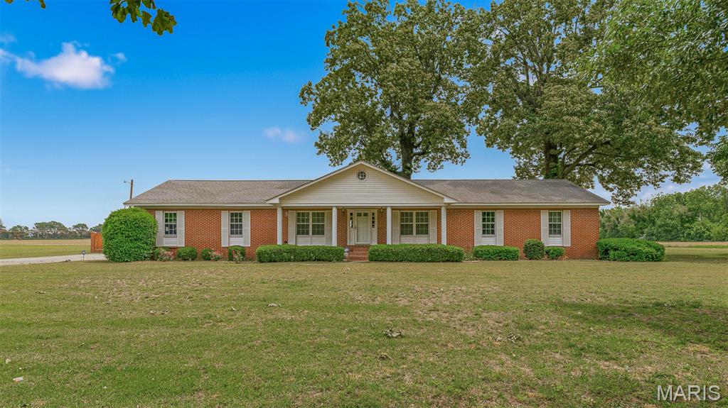 Check out this well maintained beauty! This 3 bedroom 3 bath home is in a prime location. Nestled on just over one acre of land, it gives that highly desired country- living vibe, while still being just minutes away from all the loca amenities.The custom built cabinetry in the kitchen is absolutely stunning! With a large living room, den, dining room & breakfast nook, you will have plenty of room for all of your get togethers. You are going to find lots of extras here, such as two hot water heaters, two septic systems, a patio, mature landscaping, large front porch, tons of storage & closet space, in ground well/sprinkler system & a rebar reinforced outbuilding!
Call today to set up a tour of this gorgeous home!