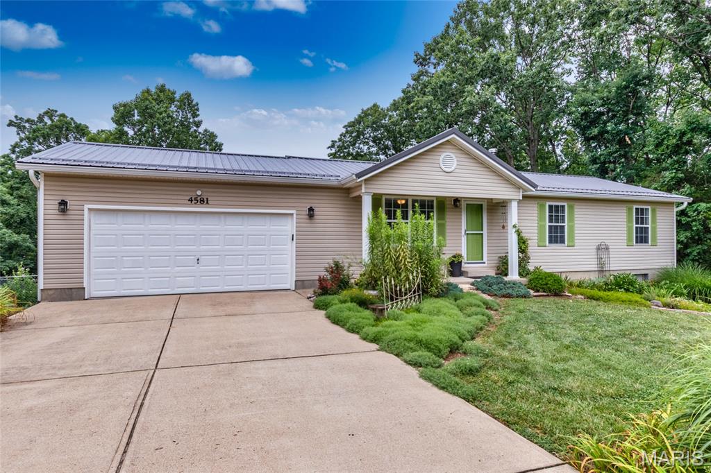 Don't miss this turnkey, move-in-ready home! Pride of ownership shows throughout with newer flooring and many updates. The main level offers 3 bedrooms and 2 full baths. The finished walk-out basement features a 4th bedroom, full bath, and a spacious rec/family room with patio access, perfect for entertaining. There is also a wood burning stove to help heat the house. Enjoy the fenced backyard that backs to trees for added privacy. The above-ground pool stays. Move in and start enjoying your new home!