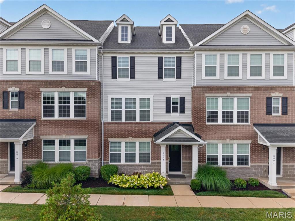 Experience upscale living in this stunning, move-in-ready townhome in the sought-after Central Park Townes community. Offering 2,144 square feet of thoughtfully designed living space, this luxury rental combines modern finishes, low-maintenance living, and an unbeatable location within the award-winning Clayton School District.

The versatile floor plan begins with a private first-floor bedroom and full bathroom, making it an ideal guest suite, home office, or workout space. This level also provides direct access to the attached rear-entry two-car garage for added convenience.

The main living level features an open-concept layout with engineered hardwood flooring, soaring ceilings, oversized windows, and abundant natural light. At the heart of the home is a beautifully appointed kitchen with a large quartz island, white cabinetry, stainless steel appliances, a gas cooktop, and ample storage. Just off the dining area, step outside to the charming rear deck—the perfect spot to enjoy your morning coffee or unwind at the end of the day. A convenient half bath completes this level.

Upstairs, the spacious primary suite offers a walk-in closet and a beautifully finished en suite bath with custom tile, quartz countertops, dual vanities, and a large shower. Two additional bedrooms share a full hall bath, while the upper-level laundry room adds everyday convenience. Every bedroom is equipped with remote-controlled privacy shades for added comfort.

Additional highlights include an attached two-car garage, modern finishes throughout, and HOA-maintained exterior grounds for easy, low-maintenance living.

Ideally located just minutes from downtown Clayton, you'll enjoy convenient access to award-winning restaurants, shopping, parks, and the Richmond Heights MetroLink station, making it easy to commute throughout the St. Louis area.

Available for immediate occupancy, this exceptional rental offers the perfect blend of location, style, and convenience. 

RENTAL SELECTION CRITERIA: Credit score 650+, monthly income of $10,500+, and excellent rental history required. Online application with a $45 non-refundable fee per adult. One-month security deposit with approval. Credit and background check performed. Tenant is responsible for all utilities. Lawn and snow removal provided by HOA. The owner pays the monthly HOA fee. Small pet(s) considered with an additional deposit.