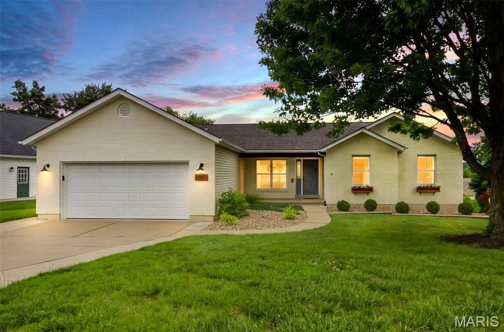 This spacious ranch offers 5 bedrooms and 3 full baths, with 3 bedrooms and 2 baths located on the main level, along with main floor laundry and 2 additional bedrooms in the beautifully finished walkout basement. The main floor showcases gorgeous flooring throughout the living areas and hallways, a wood-burning fireplace, and a kitchen designed to impress with ceramic tile flooring, quartz countertops, tile backsplash, soft-close cabinetry, and all kitchen appliances included. The primary suite features a generous walk-in closet and a luxurious bath with double vanity, tile shower with glass door, and a soaking tub framed by a picture window. All bedrooms are finished with like new beautiful carpet flooring. Downstairs, enjoy two well sized bedrooms, a full bath and an abundance of entertaining space illuminated by sleek can lighting. Step outside to even more room to gather on the wood deck or the spacious concrete pad, perfect for grilling, relaxing or hosting friends! Washington School District and close to dining, shopping and more!