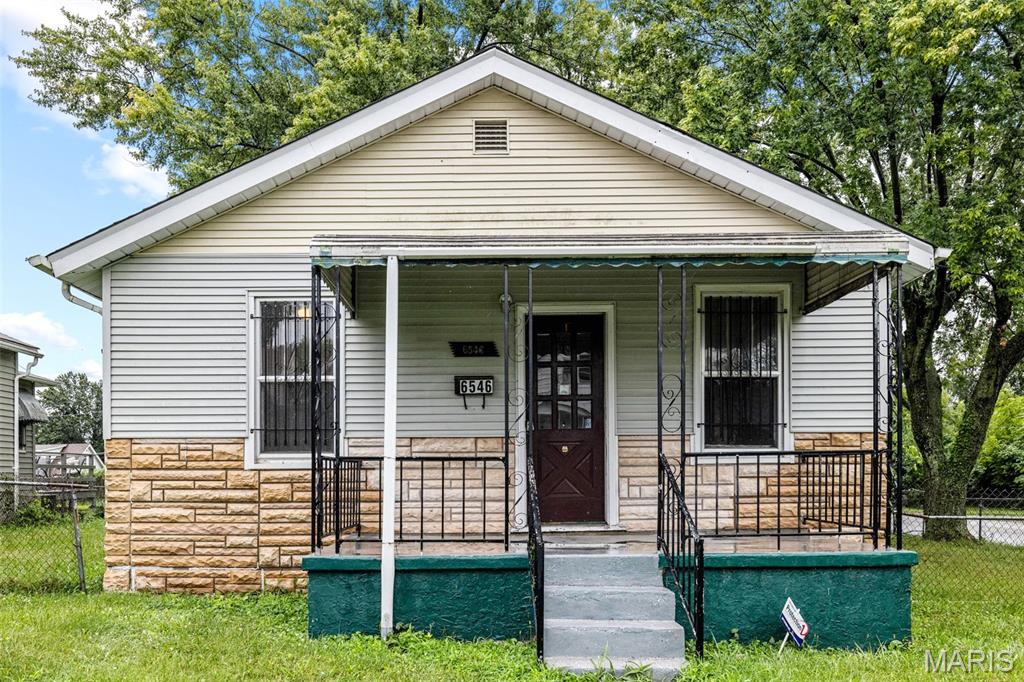 IMMEDIATE, GREAT CASH FLOW! Turnkey investment opportunity! This tenant-occupied home is currently leased at $1,100 per month, making it an excellent addition to any investment portfolio. Whether you're a seasoned investor or just getting started, this property offers reliable rental income from day one. Inside, you'll find a bright and functional layout featuring a spacious living room, two comfortable bedrooms, an updated kitchen with ample cabinet space and a dishwasher, plus a dedicated laundry/mudroom for added convenience. The home also offers durable flooring throughout much of the living space, abundant natural light, and a practical floor plan that tenants appreciate. Outside, enjoy a covered front porch, a large fenced backyard with mature trees, and a storage shed, providing plenty of outdoor space. Conveniently located near major highways, shopping, restaurants, and everyday amenities - this property combines steady income potential with long-term investment value. Close to St. Louis city and all attractions nearby. Don't miss your chance to own an income-producing property that's already generating $1,100 per month.  Showings available by appointment - please do not disturb the tenant.