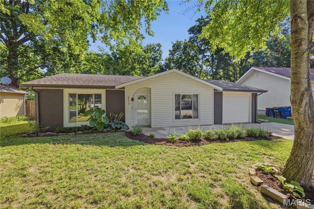 Check out this adorable home in the heart of Washington, Missouri! From the moment you walk in, you'll be welcomed by a light-filled living room and a perfectly placed coat closet to keep everyday essentials organized.

Just off the living room, the spacious eat-in kitchen offers room for a table that seats six, along with large windows, a pantry, fresh cabinetry, a large sink, and an efficient layout that makes the most of the space.

The home features two generously sized primary suites, each with its own en suite full bathroom and large walk-in closet. A third bedroom is tucked away at the end of the hall next to the third full bathroom, making it an ideal space for guests, a home office, or additional family members. The home has also been updated with stainless steel appliances and modern finishes.

Step outside and enjoy one of this home's best features—the peaceful backyard backing to a creek and the Washington bike trail. Spend your evenings walking or biking into town for dinner or ice cream at the local favorite, Dairy Delight, or continue on to enjoy the beautiful riverfront.

Located within walking distance of both Washington Middle School and Washington High School (with its famous sledding hill in the winter!), this home offers both convenience and community.

The slab foundation means no basement to maintain, no worries about leaks, and no stairs. Instead, you'll appreciate the deep one-car garage with HVAC ductwork already in place, making it a great option for a home gym, office, kids' hangout, hobby space, or additional living area—while still providing plenty of room for storage or parking. The widened driveway offers off-street parking for two vehicles.

Don't miss your opportunity to own this peaceful, move-in-ready home in one of Washington's friendly neighborhoods! For Sale by Agent / Owner.