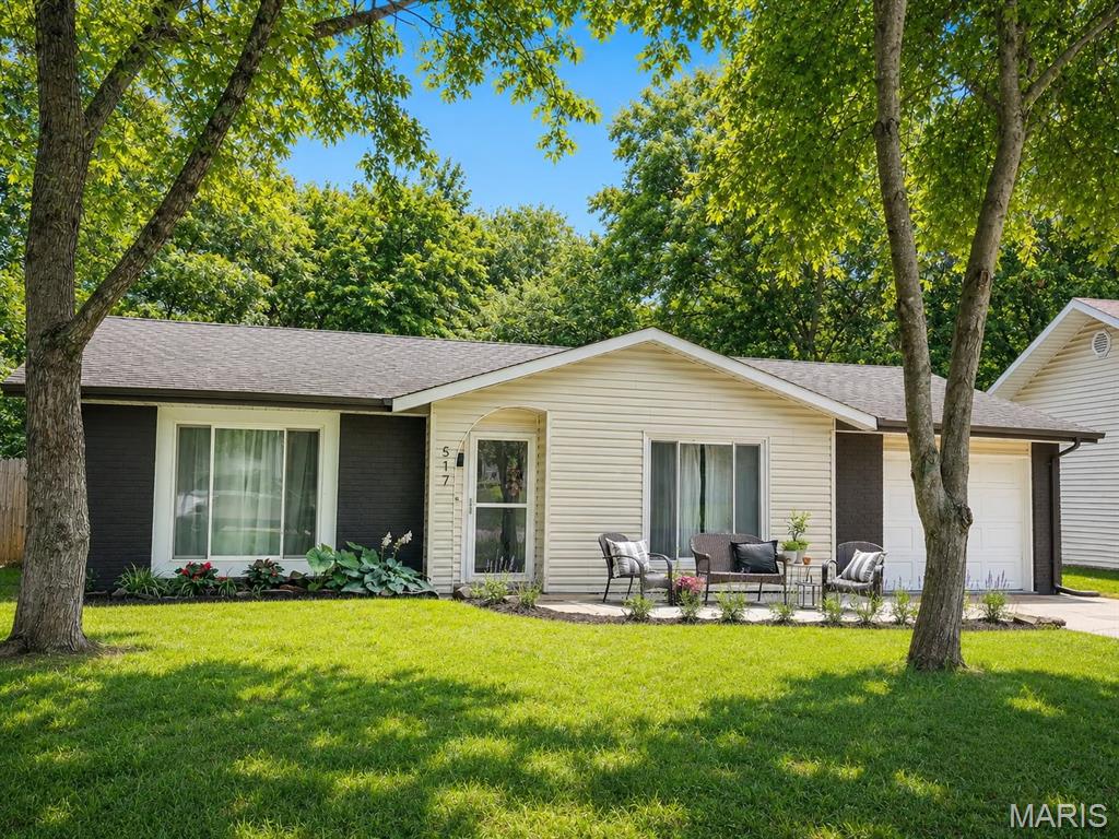 Check out this adorable home in the heart of Washington, Missouri! From the moment you walk in, you'll be welcomed by a light-filled living room and a perfectly placed coat closet to keep everyday essentials organized.

Just off the living room, the spacious eat-in kitchen offers room for a table that seats six, along with large windows, a pantry, fresh cabinetry, a large sink, and an efficient layout that makes the most of the space.

The home features two generously sized primary suites, each with its own en suite full bathroom and large walk-in closet. A third bedroom is tucked away at the end of the hall next to the third full bathroom, making it an ideal space for guests, a home office, or additional family members. The home has also been updated with stainless steel appliances and modern finishes.

Step outside and enjoy one of this home's best features—the peaceful backyard backing to a creek and the Washington bike trail. Spend your evenings walking or biking into town for dinner or ice cream at the local favorite, Dairy Delight, or continue on to enjoy the beautiful riverfront.

Located within walking distance of both Washington Middle School and Washington High School (with its famous sledding hill in the winter!), this home offers both convenience and community.

The slab foundation means no basement to maintain, no worries about leaks, and no stairs. Instead, you'll appreciate the deep one-car garage with HVAC ductwork already in place, making it a great option for a home gym, office, kids' hangout, hobby space, or additional living area—while still providing plenty of room for storage or parking. The widened driveway offers off-street parking for two vehicles.

Don't miss your opportunity to own this peaceful, move-in-ready home in one of Washington's friendly neighborhoods! For Sale by Agent / Owner.