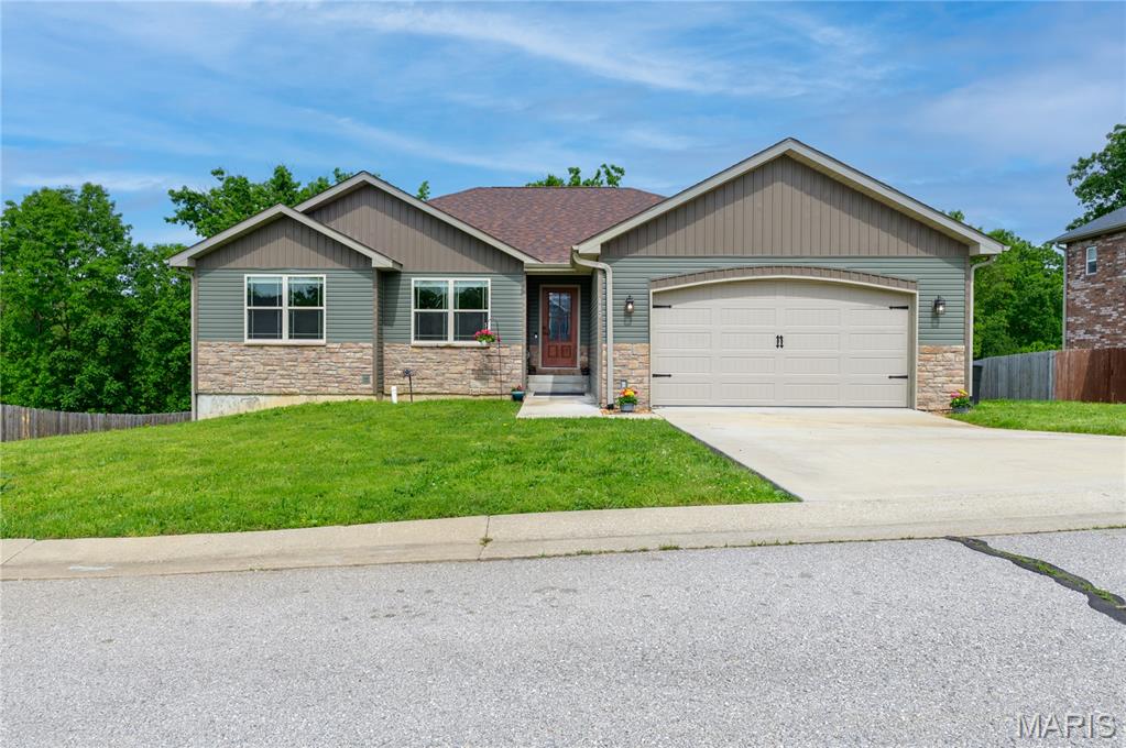Stunning newer construction ranch home in the desirable Summit Pass subdivision, set on a spacious 0.83-acre cul-de-sac lot with no HOA. Built in 2021. This move-in ready home offers 5 bedrooms, 3 baths, and approximately 3,290 square ft of beautifully finished living space, including a full walk-out basement. Freshly painted and ready for its next owner.

Step inside to an inviting open-concept layout filled with abundant natural light, vaulted ceilings, and quality finishes throughout. The spacious living room flows seamlessly into a gourmet kitchen featuring granite countertops, a large center island, custom cabinetry, stainless steel appliances, and an adjoining dining area—perfect for both everyday living and entertaining.

The main-level primary suite offers a private retreat with a large walk-in closet, dual granite vanities, and a tiled walk-in shower with glass doors. Two additional bedrooms and a full bath complete the main level.
The finished lower level provides excellent flexibility—ideal for military families needing extra space for guests, home office setups, or multi-generational living. This level includes a large family/recreation room, two additional bedrooms, a full bath, and a dedicated laundry area, along with walk-out access to the backyard.
Enjoy outdoor living with a large deck overlooking scenic Missouri hills, a fenced backyard, fire pit, and an above-ground pool with its own lounging deck—perfect for relaxing after a long day or hosting gatherings with friends and family.

Additional features include whole-house water filtration and softener systems, plus an unfinished John Deere room offering ample storage or future customization.
Located just minutes from Fort Leonard Wood, this home offers the space, comfort, and convenience ideal for military living—whether you're relocating, upsizing, or looking for a long-term home base.