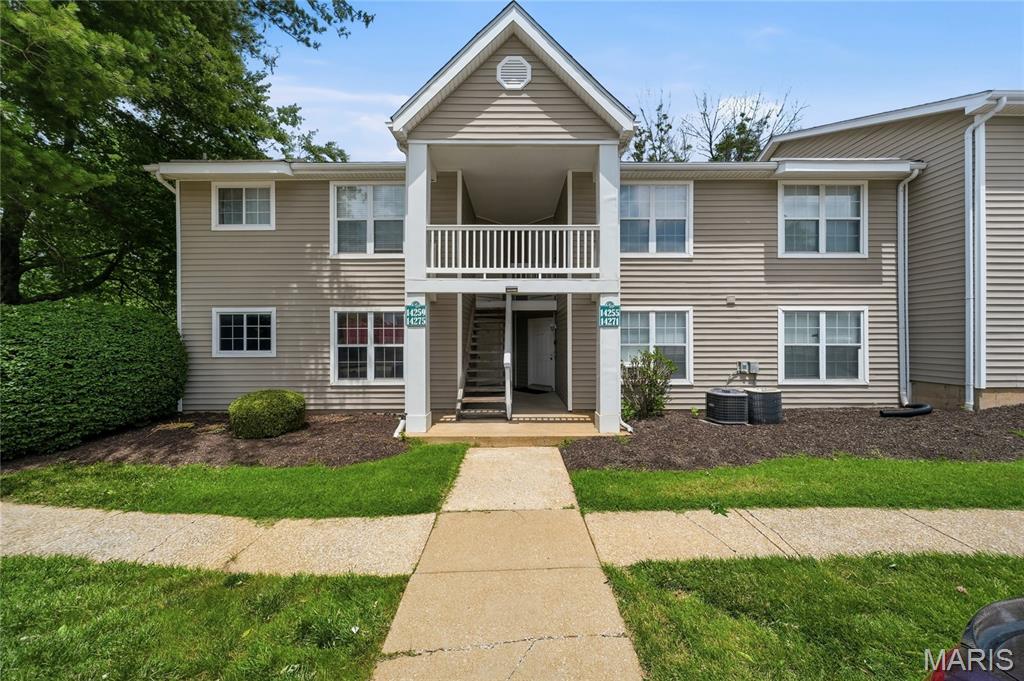 Move right into this beautifully updated second-floor condo offering comfort, convenience and low-maintenance living! With only 14 steps to your private retreat, you'll enjoy the perfect balance of privacy and easy access. This spacious unit features an open and inviting floor plan, updated finishes throughout and a stylish kitchen complete with stainless steel appliances and an attractive backsplash. For added convenience, a full-size stackable washer and dryer are located right in the unit, making everyday living a breeze.

Enjoy the convenience of two assigned parking spaces, including one covered space (also has ample parking space for your visitors too), along with your own private storage area. Residents also have access to outstanding community amenities, including a clubhouse and tennis courts located directly across from the unit. For added convenience, the community mailboxes are just a short walk away, making it easy to enjoy an active, social, and low-maintenance lifestyle.

Whether you're a first-time buyer, downsizing, or looking for a turnkey property, this move-in ready condo offers exceptional value and carefree living in a desirable Florissant location. Don't miss this opportunity!