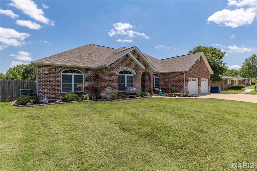 Fantastic 4-bedroom home with easy access to I-55 and Hwy 67. All four bedrooms are located on the main level, plus a bonus room in the finished walkout lower level that can serve as an additional sleeping area. The home features main floor laundry and two staircases leading to the lower level for added convenience. The finished lower level offers a spacious family room, bar/seating area, ample storage, and a half bath. Property is not located in a subdivision, giving you more flexibility. A solid, well-maintained home in a great Imperial location. Over 4,000 sq ft of living space.