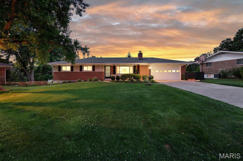Welcome to this beautifully updated 3 bedroom, 3 bathroom home in the highly sought after Ladue School District. Nearly 2,300 sq ft of living space with an open floor plan and hardwood flooring throughout the main level.

The updated kitchen features an island, stainless steel appliances, and ample cabinet space, opening seamlessly to the living room with a fireplace, perfect for entertaining. Renovated bathrooms throughout with modern finishes. Finished lower level offers additional living space, ideal for a rec room, home office, or guest area.

Enjoy outdoor living on the patio overlooking the large, level, fenced backyard. Additional highlights include a 2 car garage and a roof replaced approximately 3 years ago. Don't miss this move in ready home in one of the area's most desirable areas!