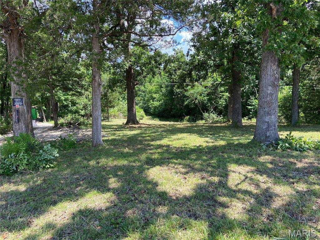 Tucked away on 1.77 peaceful acres off Athena School Rd, this is the kind of property that's getting harder and harder to find in De Soto! Recently cleared and ready for your vision, the lot welcomes you with a sweeping open front yard and a graceful circle driveway, while mature woods frame the back of the property for a private, retreat-like feel. Imagine morning coffee on the porch of your custom-built dream home, surrounded by nature yet just moments from main road access — the best of seclusion AND convenience. Water is already on site, saving you time and money on your build, and Athena Middle School sits right across the road. With this corner of Jefferson County growing steadily, this is your chance to claim a beautiful piece of it before someone else does. Blank canvas, endless possibilities — bring your builder and make it yours today! 
Seller is a licensed real estate agent in the State of Missouri.