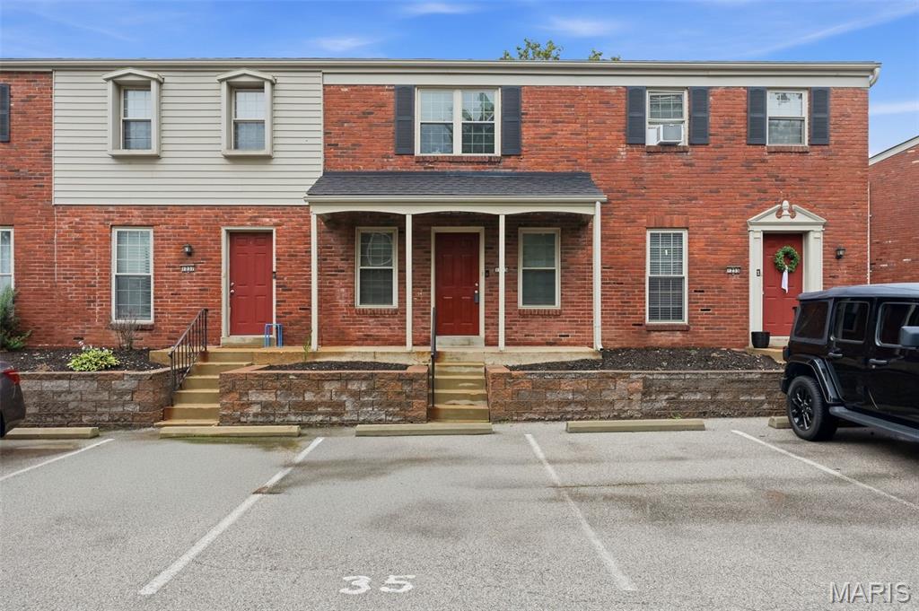 Affordable, low-maintenance living in the highly sought-after Rockwood School District! This stylish Ellisville townhome offers 2 bedrooms, 1 full and 1 half baths, plus a partially finished lower level that provides the perfect space for a family room, home office, workout area, or playroom. A beautiful, bright kitchen, convenient lower-level laundry and parking right outside your front door make everyday living a breeze. Step outside to your private fenced patio, where the complex's swimming pool is just beyond the gate—perfect for relaxing or cooling off all summer long! You'll love the unbeatable location with easy access to Manchester Road's restaurants, shopping, coffee shops, gyms, parks, the library, and top-rated Rockwood schools. Whether you're a first-time buyer, downsizing, or looking for a "lock and leave" to jet off to your vacation home, this move-in ready home offers exceptional value! Easy living, easy commuting, and a fantastic place to call home!