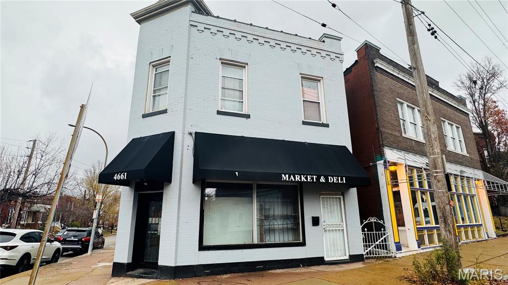 Outstanding Mixed-Use Investment Opportunity in the Heart of the City! This versatile two-story corner property offers endless possibilities for investors, entrepreneurs, and owner-occupants alike. The first building previously operated as a successful grocery store and deli in a high-traffic location and is now vacant, ready for its next business venture. Most commercial equipment is owned and included in the sale, including two deep fryers, a brand-new commercial grill, stainless steel prep tables, and a four-compartment sink, allowing you to hit the ground running. Above the commercial space is a beautifully updated, spacious one-bedroom apartment with four rooms, an open floor plan, newer vinyl flooring, fresh paint, and abundant natural light, ideal for owner-occupancy or rental income. The full basement provides ample storage for both residential and commercial use. Major improvements include approximately one-year-old furnaces and air conditioning units, a one-year-old water heater, a sewer lateral replaced approximately three years ago, a roof approximately three years old, newer flooring throughout, and a private fenced backyard. The second building has been completely gutted and is ready for your vision. With newer siding, newer windows, and a full basement, it offers tremendous potential for additional commercial space, storage, a workshop, or future redevelopment. Situated on a highly visible corner lot with excellent traffic exposure, this unique property presents an exceptional opportunity to live upstairs while operating your business below, lease both spaces for maximum income potential, or redevelop to suit your investment goals. Rarely does a property with this much flexibility, equipment, and upside become available. Schedule your private showing today! The property is to be sold as-is. Seller will not provide any inspection or repair.