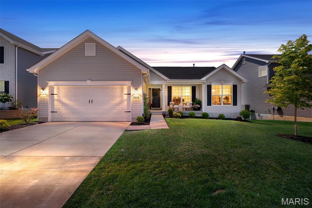 Better than new and truly move-in ready, this 2-year-young McBride Hickory ranch offers 3 bedrooms, 2 full baths, and all the upgrades already in place! Situated on a desirable walkout homesite, the bright open-concept design features beautiful wood laminate flooring, vaulted ceilings, oversized 6-foot windows, and abundant natural light. The stunning kitchen flows seamlessly into the dining area and boasts quartz countertops, crisp white 42” cabinetry, stainless steel GE appliances, a breakfast bar, and two pantries, including a corner walk-in pantry currently serving as a stylish home office. The private primary suite offers a custom-organized walk-in closet and spa-like bath with adult-height double vanity, white cabinetry, soaking tub with window, walk-in shower, and linen closet. A stained stair cap and half wall lead to the walkout lower level, complete with a bath rough-in and ready for your finishing touches. Outside, enjoy the partially fenced backyard with plenty of space to relax, entertain, or play. Located in the award-winning Rockwood School District and offering access to Polo Grounds amenities including scenic lakes, pickleball courts, a playground, and clubhouse, this home checks every box!