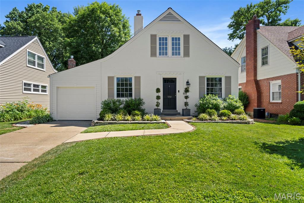 Tucked away on a quiet no-thru street in highly desirable Webster Groves, this beautifully updated 1.5-story brick home blends timeless character with exceptional custom updates and thoughtful modern living. This 3 bedroom, 3 bath classic is filled with warmth, natural light, and high-end finishes rarely found at this price point. A stunning 2022 addition transformed the home with a spacious custom eat-in kitchen and luxurious primary ensuite bath. Designed with both beauty and function in mind, the kitchen features gorgeous Danby marble countertops, custom walnut cabinetry with built-in drawers and organization systems, a custom copper hood, large pantry, and abundant gathering space for everyday living and entertaining. A charming glass paneled door leads to the mudroom, adding even more character to the home’s thoughtful design. The main floor primary suite offers two closets and a spa-like ensuite bath flooded with natural light from a skylight. Heated floors, a freestanding soaking tub, and walk-in shower create a true retreat. An additional full bath on the main floor adds flexibility and convenience for guests or family living. Hardwood floors run throughout the home, complemented by newer windows, built-in bookshelves in both the living room and dining room, and inviting spaces filled with charm and architectural detail. The vaulted screened porch with custom screens extends the living space outdoors and overlooks the beautifully landscaped, level fenced backyard. Outdoor living is equally impressive with a flagstone patio, fire pit area, and gas line for grilling. The attached one-car garage provides additional convenience and storage. Located just moments from Old Webster's favorite restaurants, coffee shops, boutiques, and community events, this home offers the opportunity to enjoy everything Webster is known and loved for — tree-lined streets, walkability, timeless homes, and an unmatched sense of community. A rare blend of classic charm, modern luxury, and everyday comfort - don't miss it!