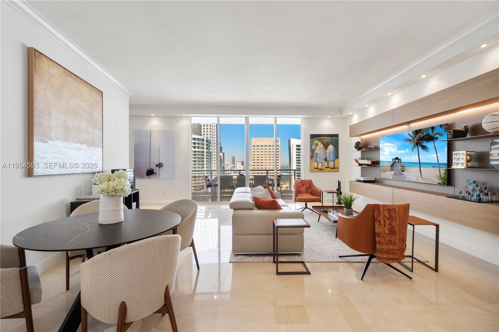 A gorgeous and spacious 3-bedroom residence, fully furnished and thoughtfully upgraded. Soaring high ceilings and an expansive terrace overlooking Biscayne Bay—accessible from every bedroom—create a seamless blend of indoor elegance and waterfront serenity.

Located in the exclusive island enclave of Brickell Key, this exceptional residence at Carbonell stands as a true jewel. The building features a recently renovated lobby and resort-style amenities, including a bayfront pool, state-of-the-art fitness center, tennis courts, spa, and more. All within walking distance to the island’s charming marketplace, cafés, sushi restaurant, waterfront park, and the peaceful, refined lifestyle that defines Brickell Key.

The primary suite offers a spacious and elegant bathroom with soaking tub, separate glass-enclosed shower, double vanity, and a generous walk-in closet, delivering both comfort and sophistication.