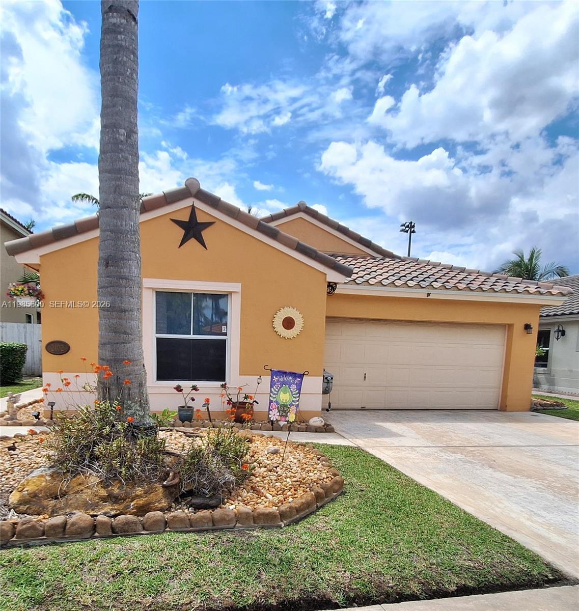 **Brand new roof**  **Brand new electrical panel**  Charming 3-bedroom/2-bath single-family home in the highly desirable Tapestry community of Pembroke Pines.  Enjoy a large fenced extra private backyard that backs onto a huge soccer field ensuring you'll never have backyard neighbors obstructing your view or privacy. Features include a brand new roof with 14 1/2-year warranty, 2-car garage, concrete driveway fitting two cars, concrete walkway leading up to front door, covered open patio with concrete floor — perfect for barbecuing and enjoying the outdoors while birdwatching — updated bathrooms, master bath with shower seat, (indoor laundry) brand new washer, newer dryer and fridge, large shed for extra storage.  Association includes cable, highspeed internet, and free access to all the amenities at Price Park (pool, tennis, basketball, picnic area, etc).  Conveniently located in an A-rated school district and close to parks, shopping, and dining.  Don’t miss this opportunity — schedule your showing today.