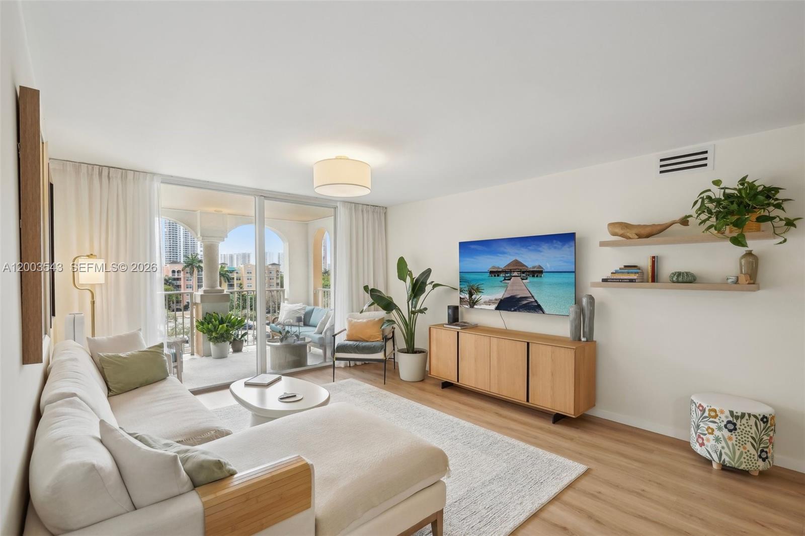 Best deal at Yacht Club. Very Top quality 2-bedroom condo on prestigious Country Club Drive—ideal as a full-time residence or a luxury vacation getaway. This top-floor unit features designer finishes in natural tones, a high-end kitchen, and quality materials throughout. Enjoy a spacious balcony with skyline views, and the convenience of an in-unit washer/dryer smartly built into a custom closet in the second bedroom. Live like you're on vacation every day with resort-style amenities including: Sparkling pool, Tennis and squash courts, Fully equipped gym, BBQ area. Investor-friendly: eligible for placement in a short-term vacation rental program. Benefit from proximity to top-rated schools, vibrant social life, restaurants, shopping, and public transportation. Just move in and enjoy the Aventura lifestyle! Lowest monthly maintenance fees in the area!