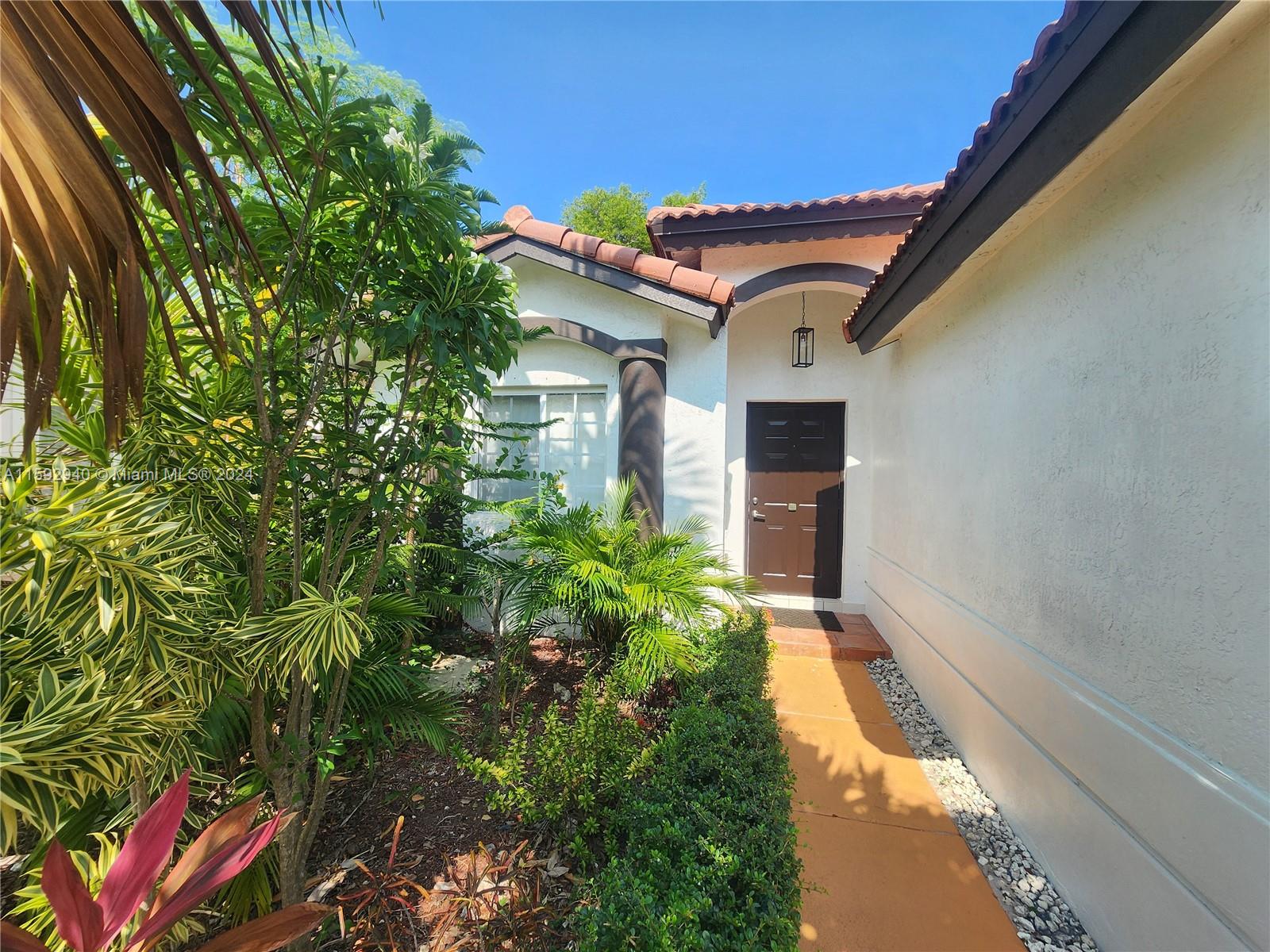 Stunning 3 beds, 2 baths home in Lakes by the Bay. The home features tile throughout in common areas and laminate wood floors in the bedrooms. This home boasts a very spacious master bedroom with walking closet tile roof, kitchen with granite countertops and breakfast nook, charming wood fenced patio is perfect for entertaining or relaxing. Hurricane shutters in all windows. The community offers an adults and kids pool, playground. Just 12 Minutes away from Black point park and Marina. You will love it!