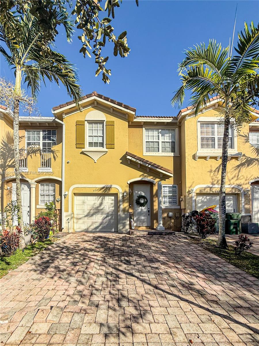 Beautifully renovated 3 bedroom, 2.5 bath lakefront townhouse with single car garage in the gated community of Villa Portofino West. This home offers comfort, functionality and thoughtful upgrades throughout. Originally featuring 4 bedrooms, home was converted to 3 bedroom creating an extra-large primary retreat with room for sitting area and features his and her closets with spacious ensuite bathroom. The kitchen boasts upgraded stainless steel appliances, ample cabinetry and generous counter space. New HVAC system installed in 2021. Tile floors throughout. Enjoy a private, fenced in lakefront backyard perfect for pets, play or entertaining. Single car garage offers additional storage and large driveway with plenty of parking. Residents enjoy access to the community pool and pay low HOA fees. Conveniently located near major highways with easy access to Miami and the Keys! Minutes to dining, entertainment, Homestead Baptist Hospital, Homestead Air Force Base, schools shopping and much more! Schedule your showing today!