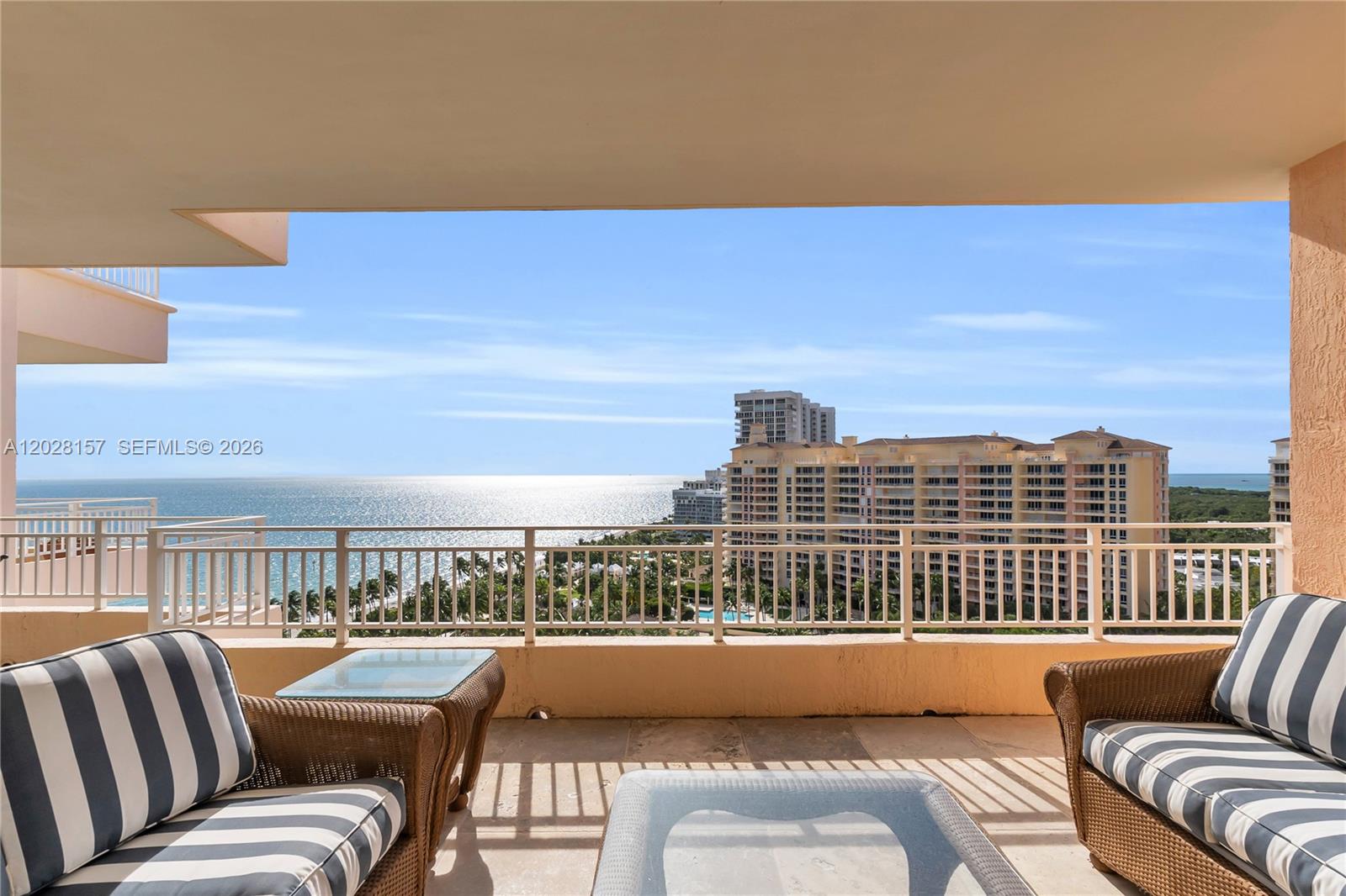 An exceptional penthouse on the top floor of Ocean Tower 2, on the market for the first time. Spanning 2,510 square feet, this elegant residence features 3 bedrooms and 3 full bathrooms, with sweeping ocean and city views from floor-to-ceiling windows.
Two private elevators open directly into your own foyer. Inside, soaring penthouse ceilings create an airy, open feel throughout all three bedrooms and living spaces, each positioned to capture the building's best views. Elegant marble floors and 2 assigned parking spaces complete the home.
Set within the gated Ocean Club, a 52-acre oceanfront enclave with 1,000 feet of private beach frontage, residents enjoy resort-style living at its finest: a private Beach Club, multiple pools, clay tennis and padel courts, a beachside bar and grill, fine dining, a spa and fitness center, concierge and valet service, and beautifully landscaped grounds surrounding a private lake.
A penthouse opportunity at one of Key Biscayne's most coveted addresses