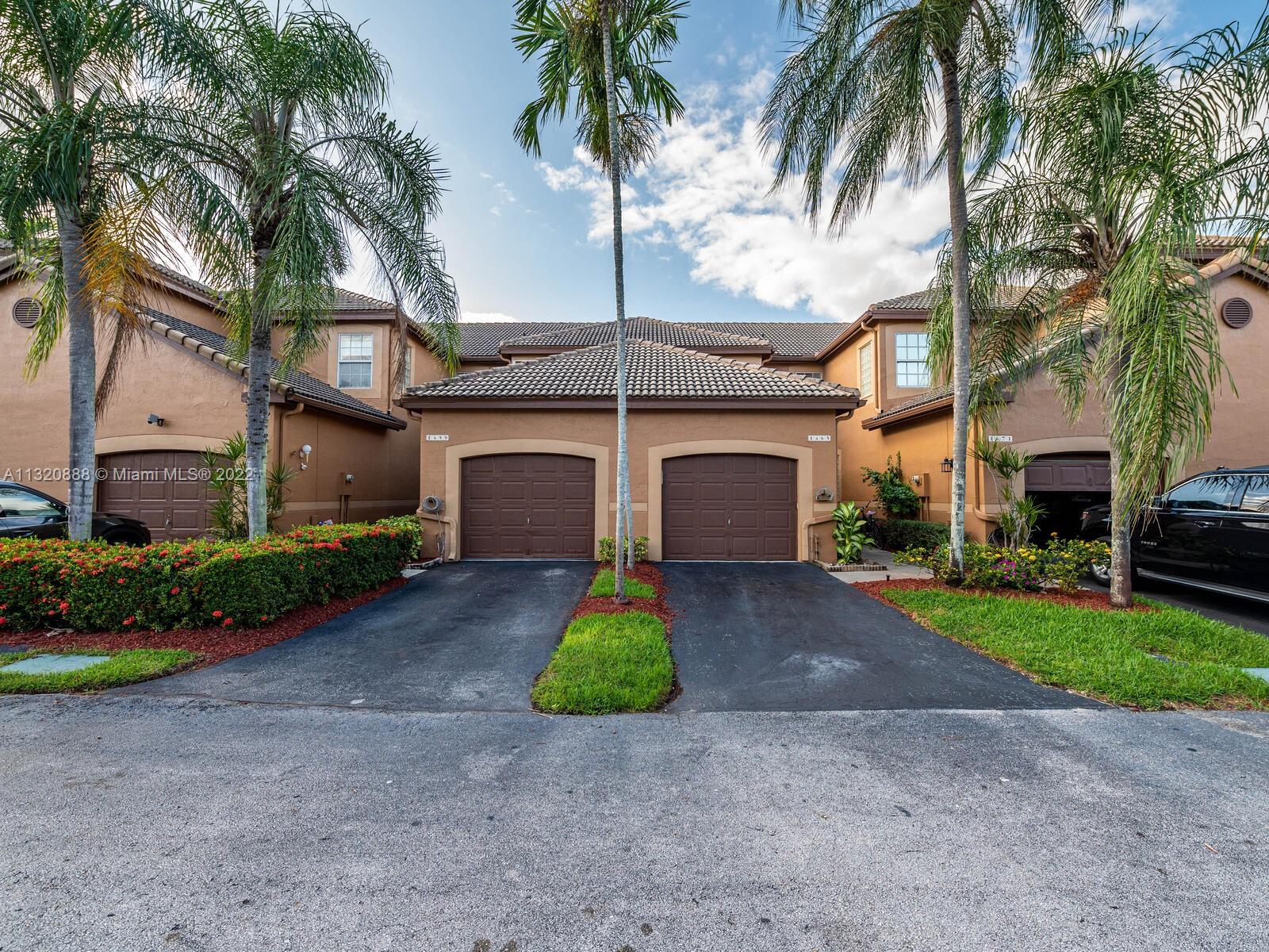 Truly remodeled Townhome, Kitchen includes granite countertops & stainless steel appliances. 1 car garage, 2 master bedrooms, ceramic tile on the first floor Pergo on 2nd floor, breakfast area, and screen patio. The complex offers a community pool & playground.