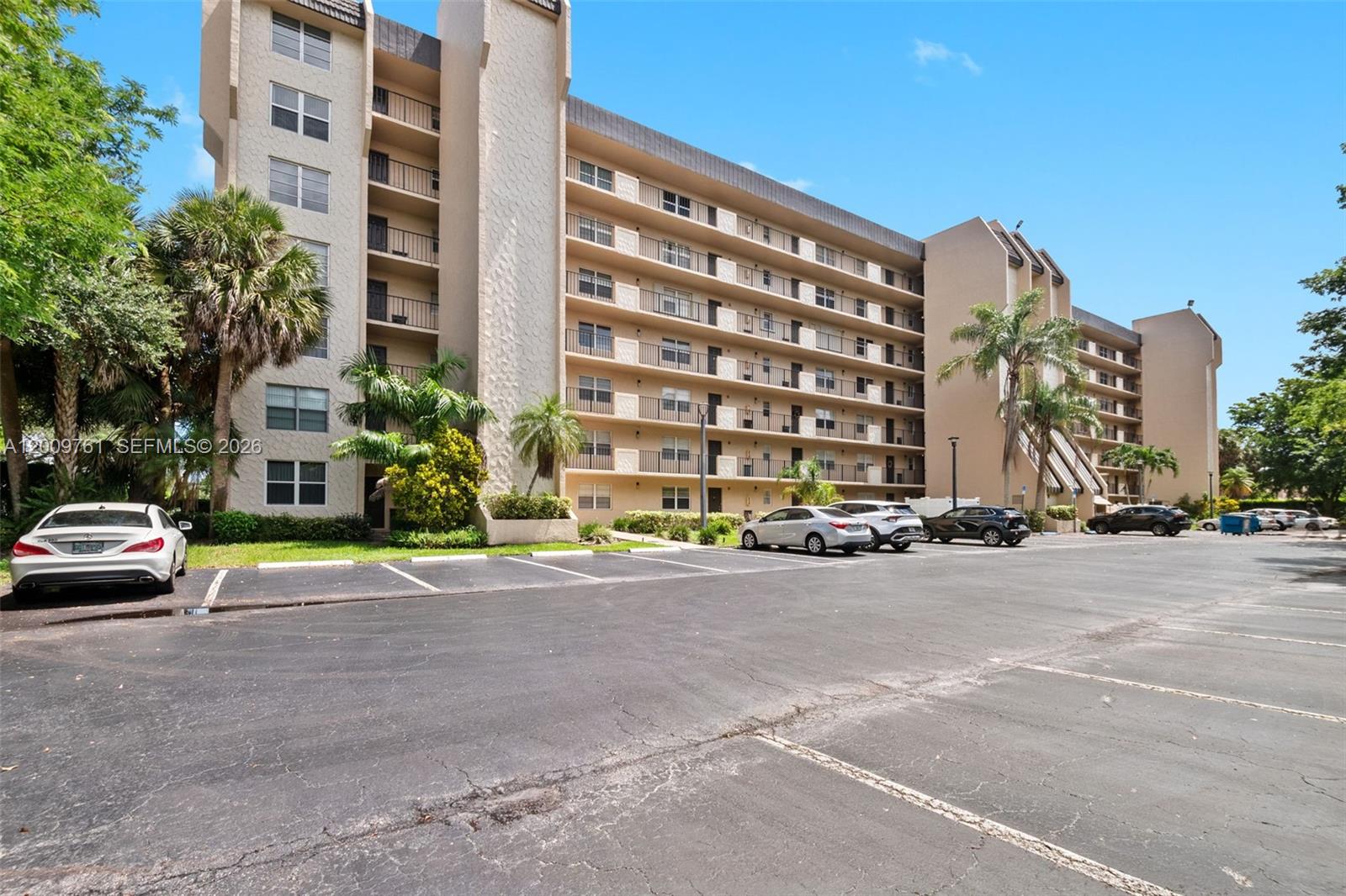 Spacious and impeccably maintained 2-bedroom, 2-bath corner condo offering an oversized layout filled with natural light. This pristine unit features a desirable corner location with serene golf course views and a private balcony where you can enjoy the vibrant nightly light show from the nearby Hard Rock Hotel.  The expansive floor plan provides generous living and dining areas, ideal for both relaxing and entertaining. Pet-friendly community with well-kept surroundings.  Conveniently located just minutes from Nova Southeastern University and other major colleges, shopping, dining, and major highways. Leasing permitted after the first year of ownership, making this an excellent option for both end-users and future investors.  Comes with coveted assigned parking spot close to walkway.   Move-in ready and truly a must-see!