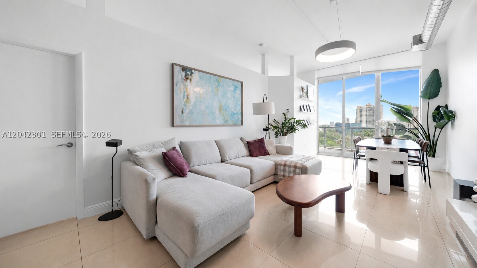 Stunning 3-Bedroom, 2-Bathroom Industrial-Chic Loft at Uptown Marina Lofts.
Experience luxury waterfront living in this bright and spacious loft-style residence featuring soaring 11-foot ceilings, sleek tile flooring, and dramatic floor-to-ceiling glass windows that fill the home with natural light. Enjoy two private balconies offering serene Intracoastal and canal views, creating the perfect setting for morning coffee or evening relaxation.
The modern kitchen is appointed with premium cabinetry, stainless steel appliances, and ample storage, seamlessly flowing into the open-concept living and dining areas. The spacious primary suite and well-designed split floor plan provide both comfort and privacy.
Residents of Uptown Marina Lofts enjoy exceptional amenities, including a 24-hour attended lobby, resort-style swimming pool, state-of-the-art fitness center, spa, tennis court, and a private 29-slip marina. The pool and tennis court were recently remodeled in 2026, and the community benefits from a well-managed HOA.
Ideally located in the heart of Aventura, just minutes from Aventura Mall, fine dining, parks, houses of worship, and the beautiful beaches of Sunny Isles Beach.
A rare opportunity to own a stylish waterfront loft in one of Aventura's most desirable communities. Move-in ready, and a must-see.
