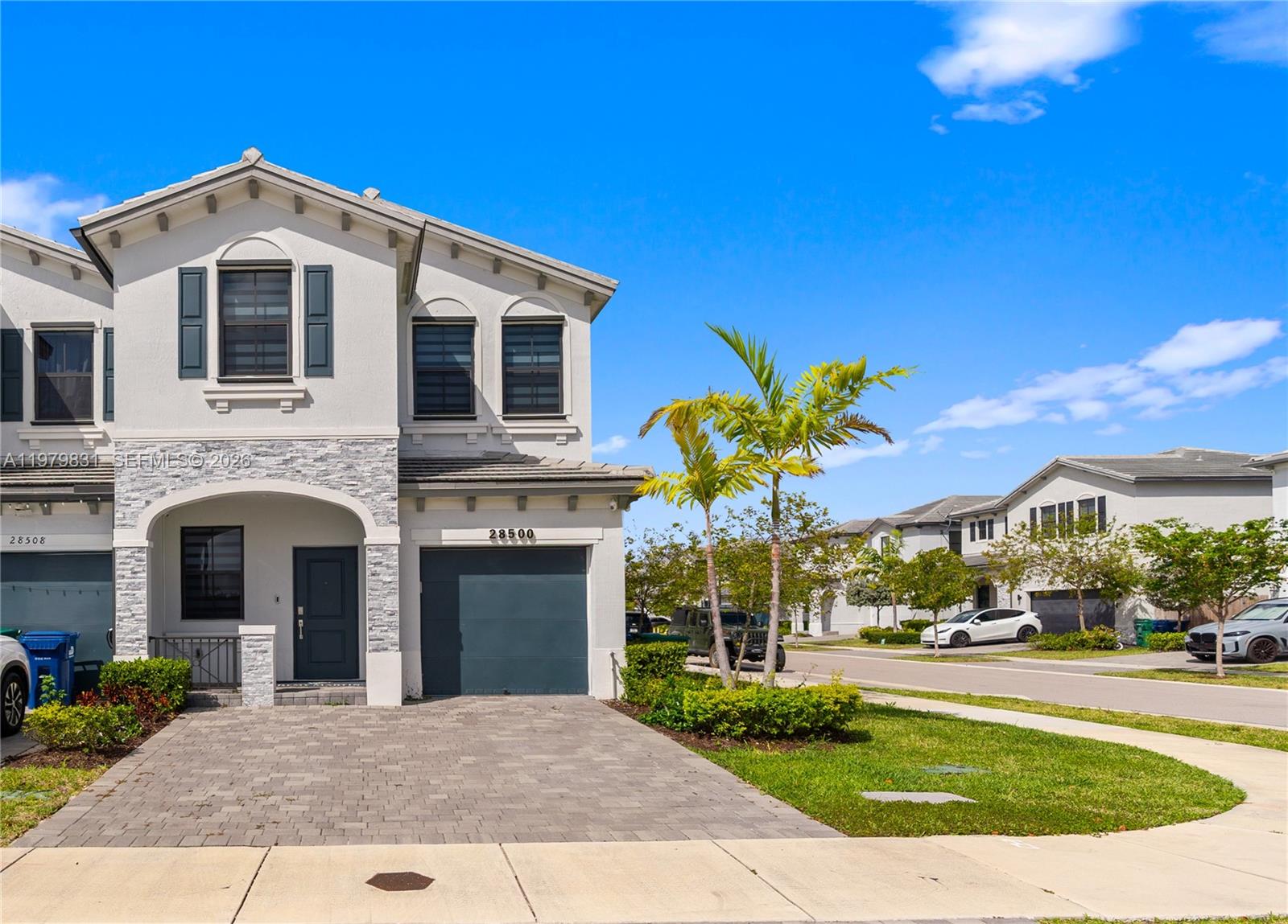 Stunning luxury corner-unit townhouse located in a resort-style gated community in the rapidly growing city of Homestead.This property features 3 bedrooms, 2.5 bathrooms, a 1-car garage, and additional parking in the driveway. The desirable corner lot offers extra privacy and abundant natural light.Enjoy a private backyard perfect for relaxing or entertaining. The home features a spacious and modern layout designed for comfortable living. 
A full glass wall provides visibility into the elegant interior living area, enhancing the open and modern feel of the home. This unique space is ideal for a private gym, game room, showroom, office, or creative studio, adding both style and functionality to the property.The community offers resort-style amenities within a secure gated environment.Conveniently located near major highways, shopping centers, restaurants, and schools.