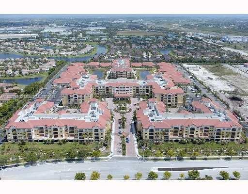 The Palms at Weston Luxury 55+ Resort Style Community 2 Bed / 2.5 bath Condo on last floor with a large balcony and splendid and relaxing view facing North to the community lagoon and fountain. Five minutes from Cleveland Clinic and walkable to Publix, Walgreens and restaurants and banks at Weston Commons across the street. Fabulous amenities including fitness center, library, business center, board games room, tearoom, solarium, resort style pool, first aid, spa saloon, restaurant and valet parking. Includes water, cable and high-speed internet. Property has an extra storage room in the hallway. Watch the video walkthrough clicking the virtual tour on the MLS.
