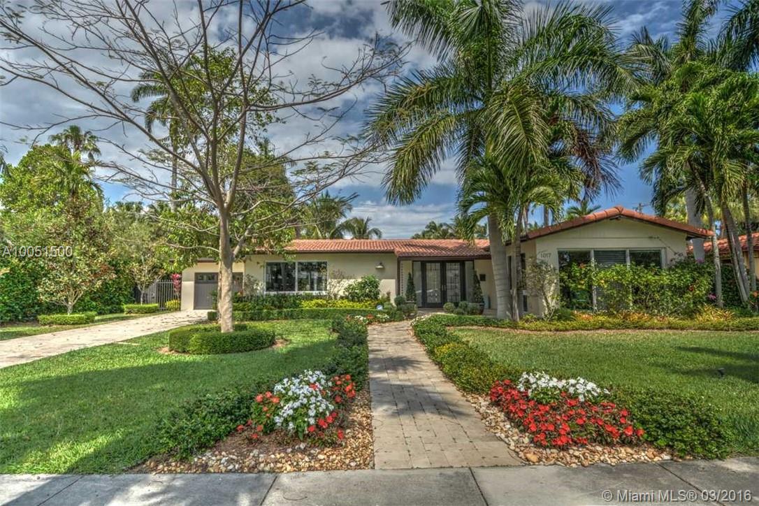 Magnificent luxurious  home, spacious & bright 4 bedroom 3 bath, split floor plan, fully remodeled, state of art upgrades Chefs kitchen has high end appliances w/granite countertops. 2 master suites w/walk-in closets, Master bath has rainfall shower head, double sink. 3 car garage, double lot, Unbelievable custom pool & Jacuzzi setting in the center of the courtyard, this is a home for entertaining making this property one of a kind. Walking distance to the beach and downtown Hollywood.