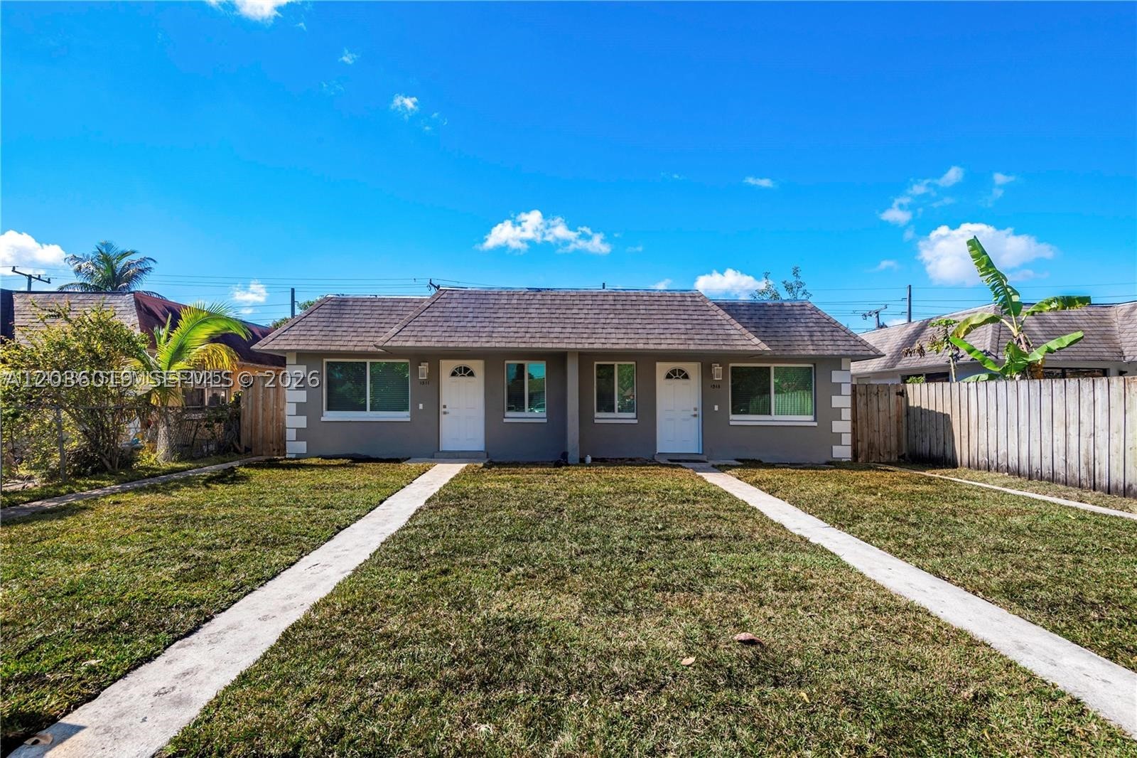 Prime investment or live-in & income opportunity! This upgraded duplex features two spacious 3-bed, 2-bath units, a rare find in the area. Each unit boasts modern finishes, in-unit washer/dryers, and a newly landscaped yard with fresh sod. Recent updates include new hurricane windows, doors, electrical panels, and underground plumbing (2025). Newer AC units (3-4 years old) and a 2015 roof provide peace of mind. Conveniently located near beaches, shopping, and dining. Don't miss this turn-key income property! Vacant with easy access.