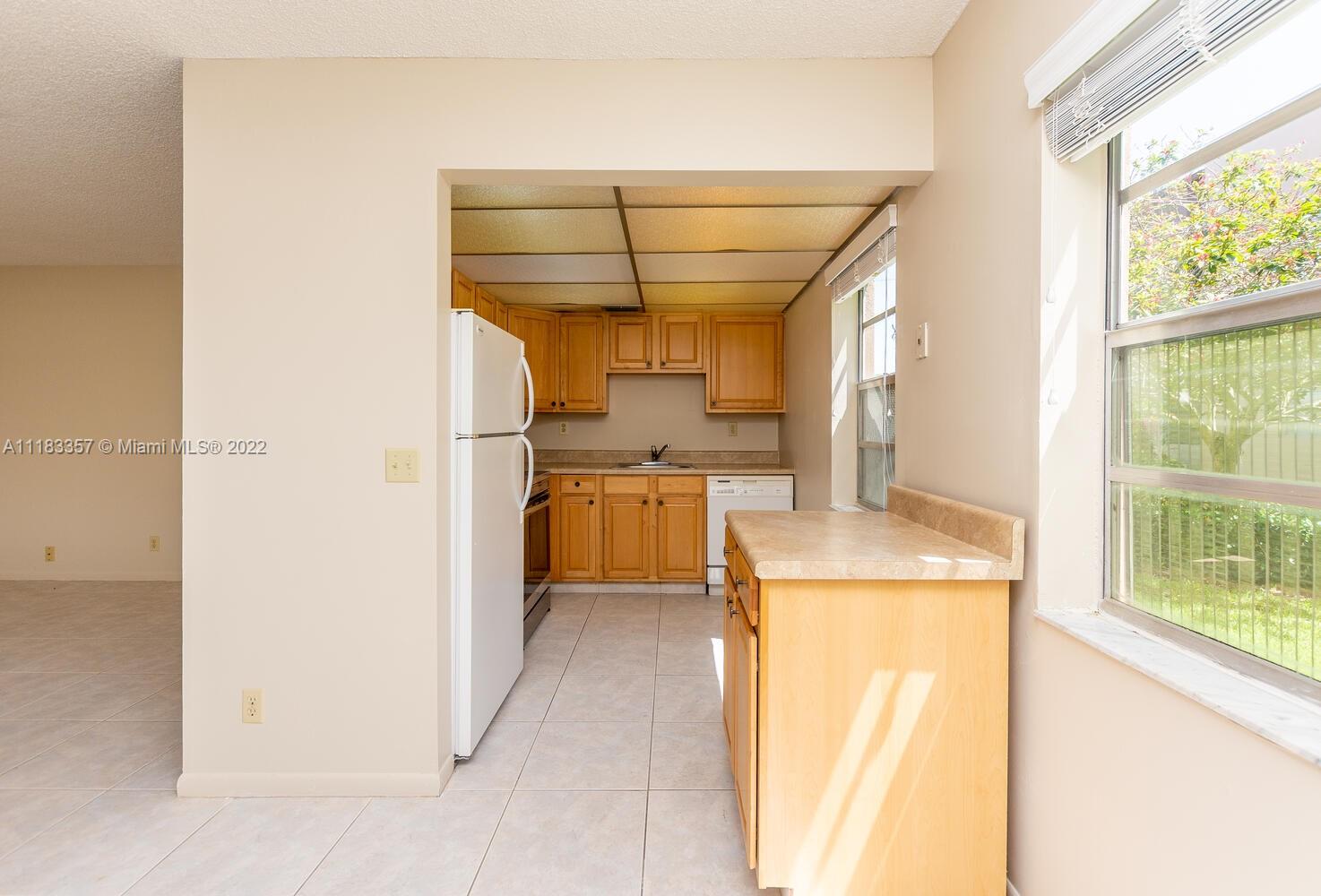 KINGS POINT BURGUNDY COND - Residential