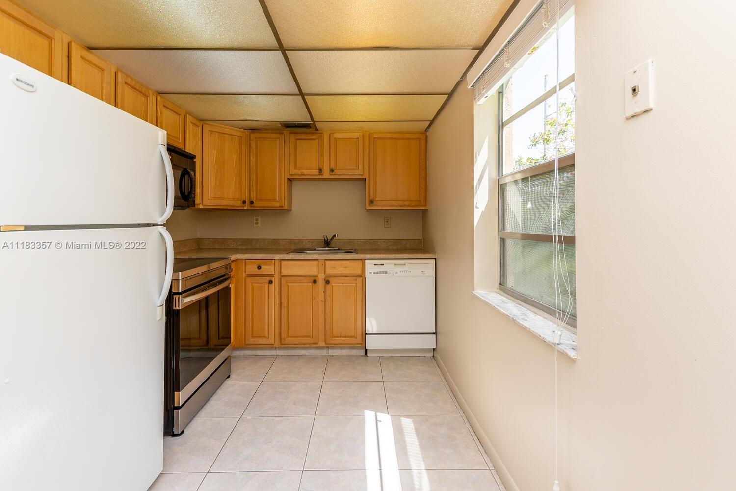 KINGS POINT BURGUNDY COND - Residential