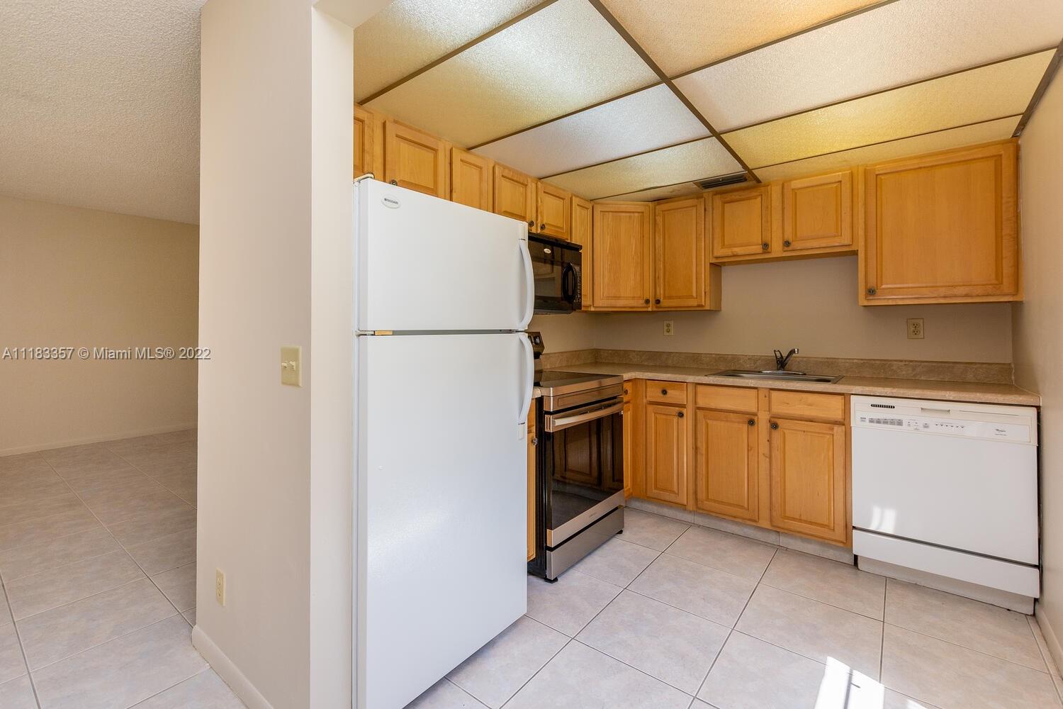 KINGS POINT BURGUNDY COND - Residential