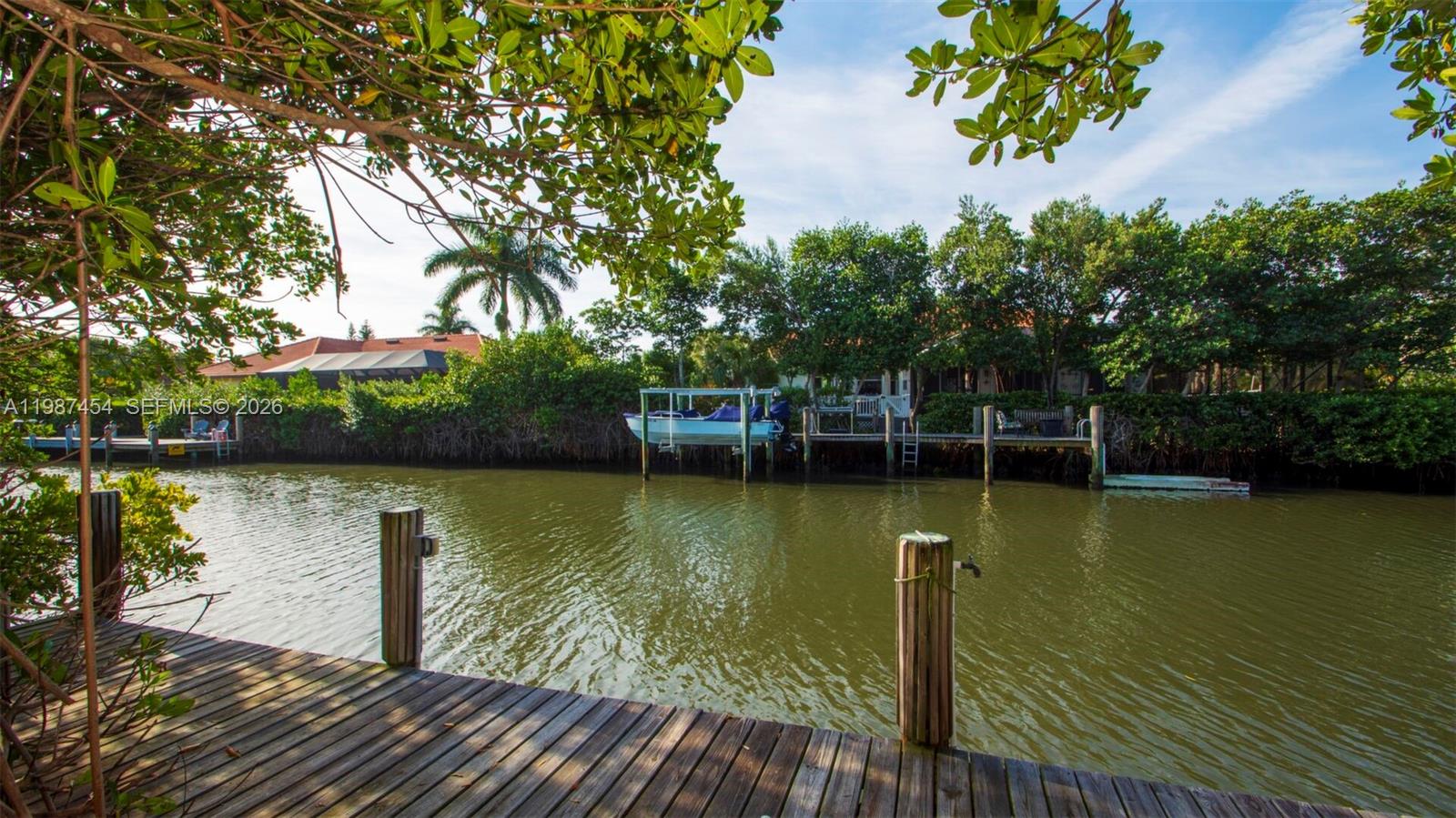 Your magnificent coastal retreat awaits you within St. Christopher Harbor! Just South of the Moorings this tranquil setting just far enough away from the hustle n’ bustle yet still close enough to all local thrills! No gates and no thru traffic! Enjoy being greeted by the peaceful Manatee and schooling Tarpon in the morning from the private dock through the mangroves. This estate will raise your taste for decadence as you reel in the high volume ceilings, high-end finishes, oak flooring, and open kitchen space. Your oversized lot provides a perfect visionary palate to place a relaxing tropical pool oasis! Plus your just 5 minutes to St. Christopher's private beach access! This is IT! The opportunity of a lifetime that will make say "WOW!"